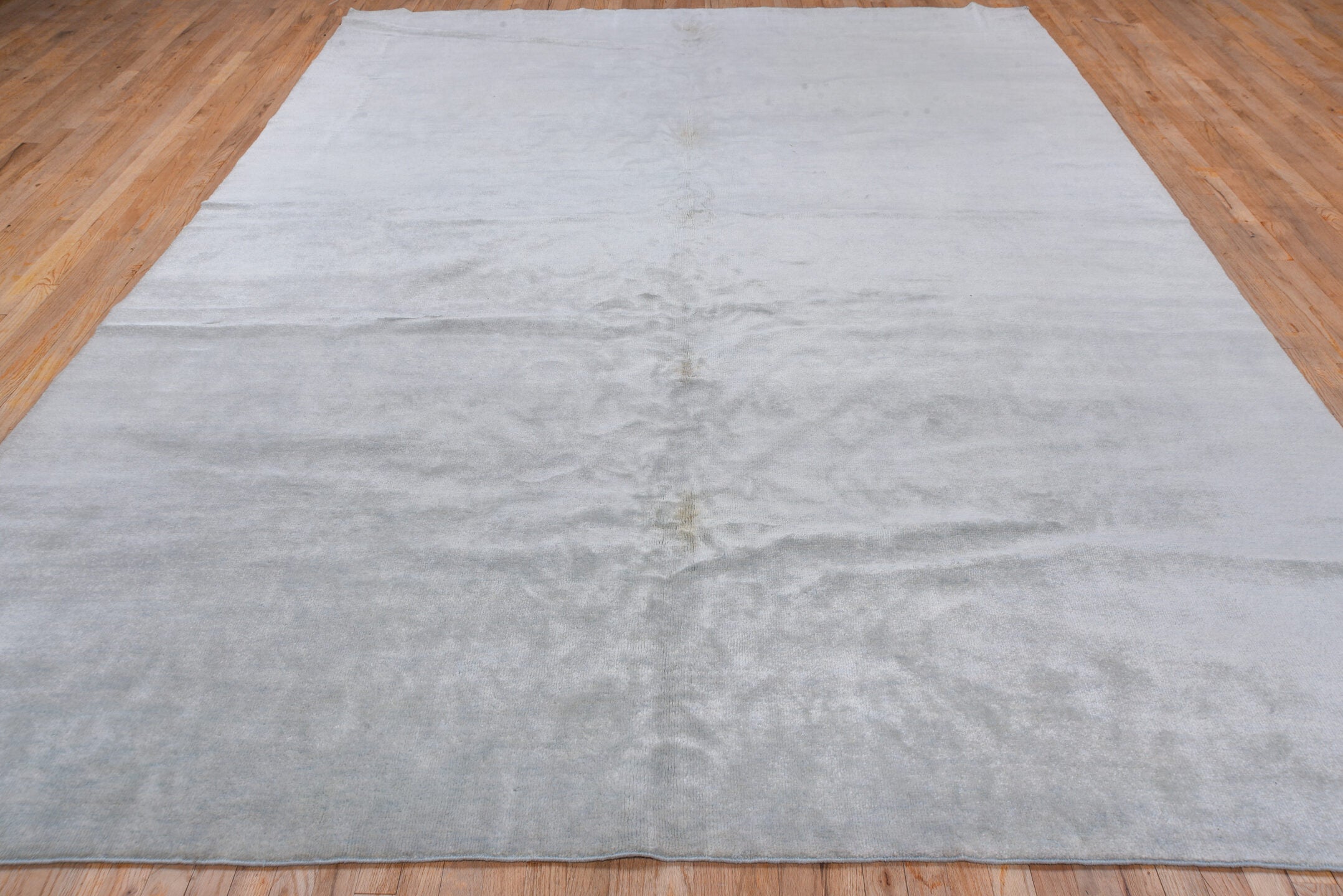 9' x 12' one-of-a-kind handmade vintage Rad large size rug. Color palette: ivory, pale blue, cream, taupe, light blue, beige