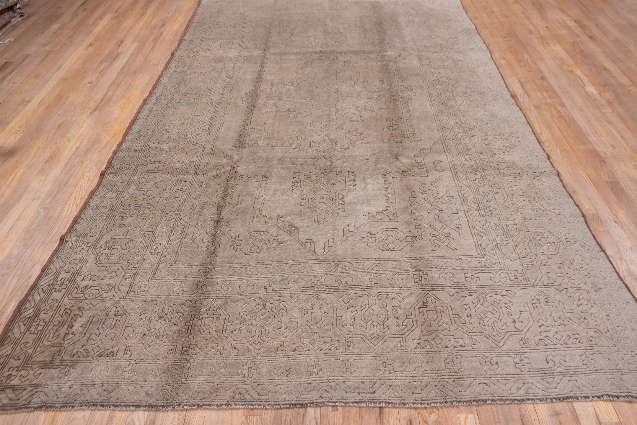7' x 11' one-of-a-kind handmade vintage Oushak large size rug. Color palette: taupe, beige, ivory, camel, brown, gray