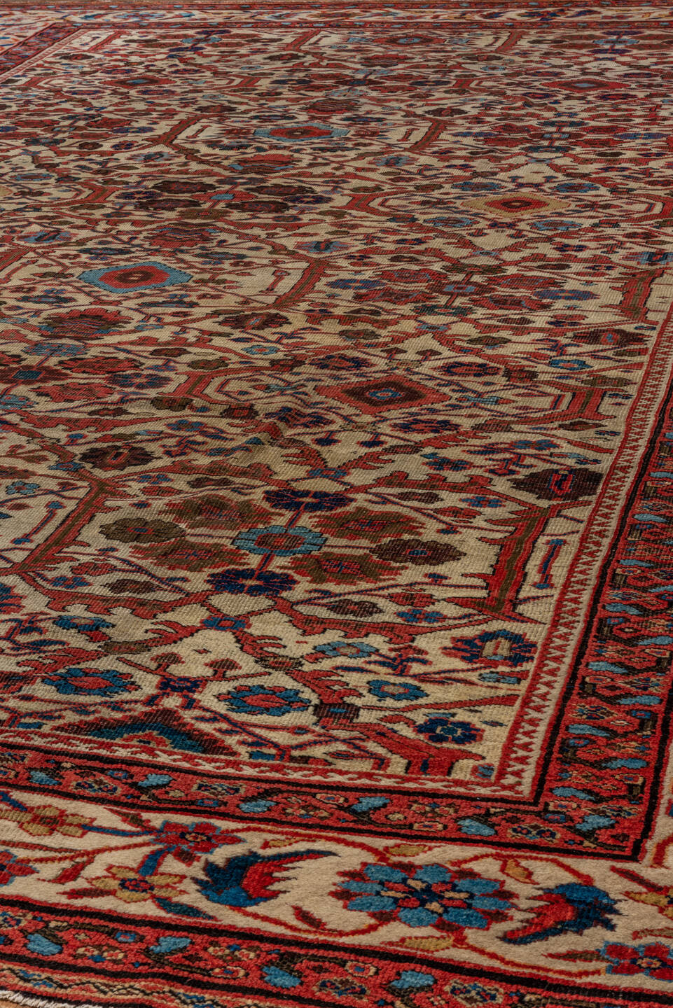 12' x 15' one-of-a-kind handmade antique Sultanabad oversize rug. Color palette: ivory, rust, brick, indigo, sky_blue, camel