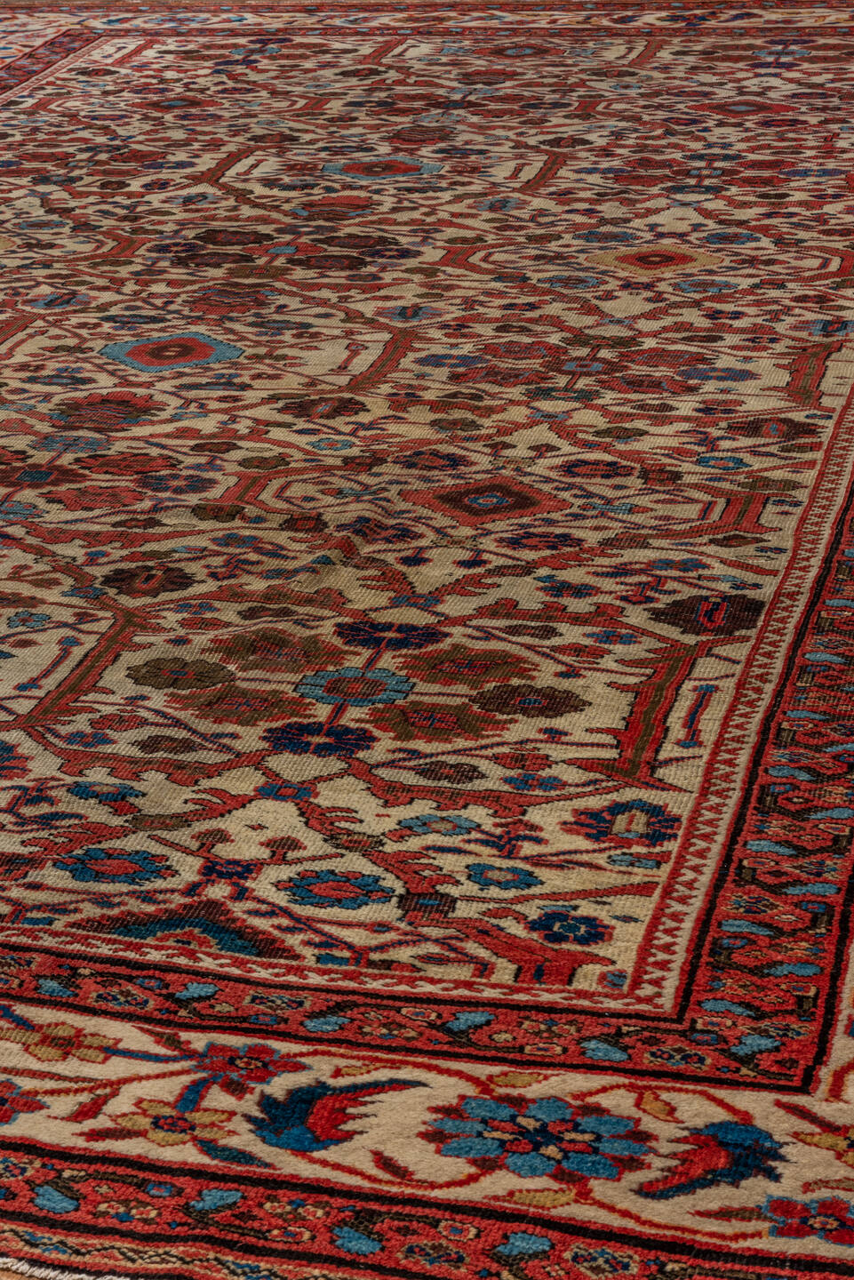 12' x 15' one-of-a-kind handmade antique Sultanabad oversize rug. Color palette: ivory, rust, brick, indigo, sky_blue, camel