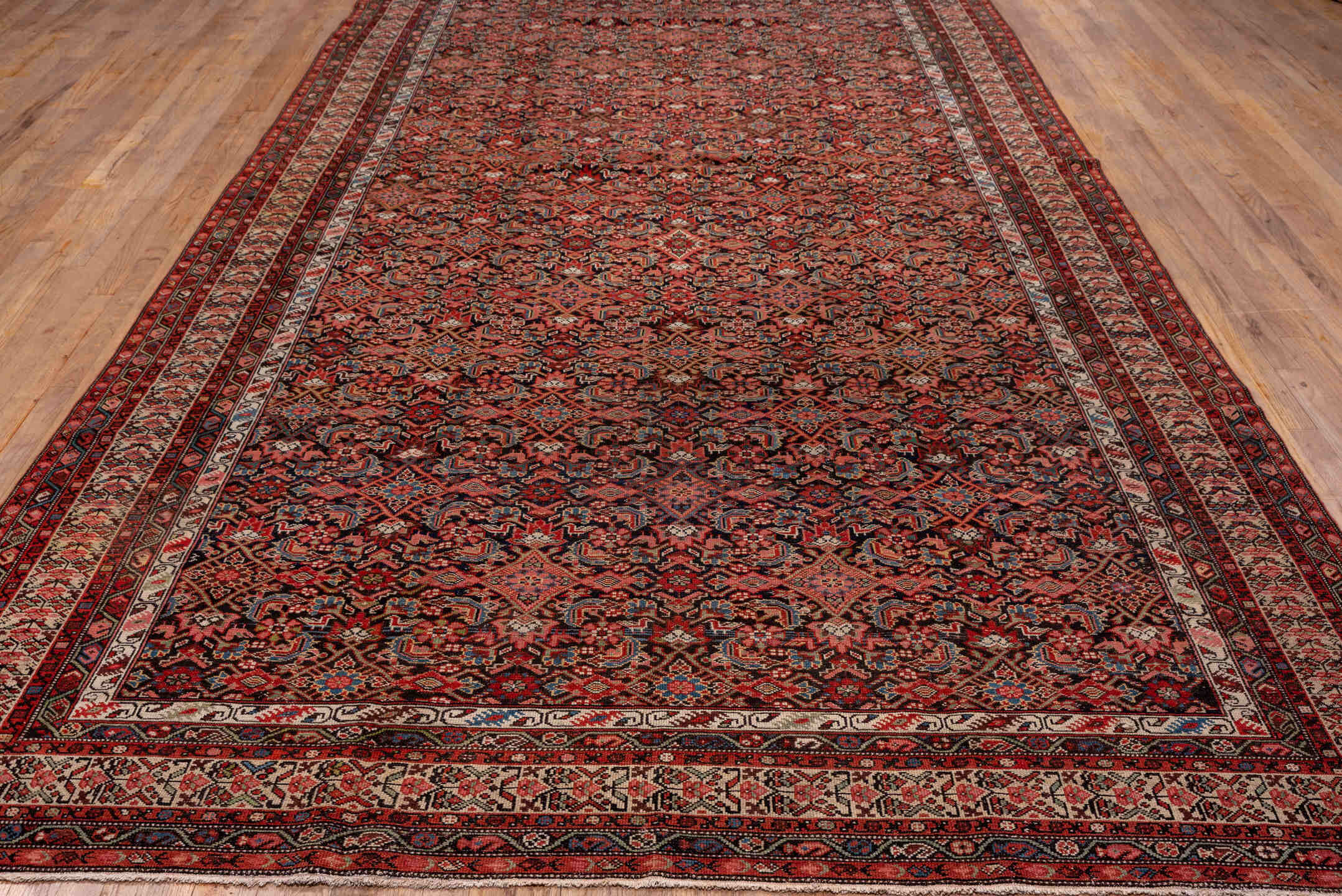 7' x 16' one-of-a-kind handmade antique Malayer rug. Color palette: navy, rust, ivory, brick, slate blue, rose, charcoal