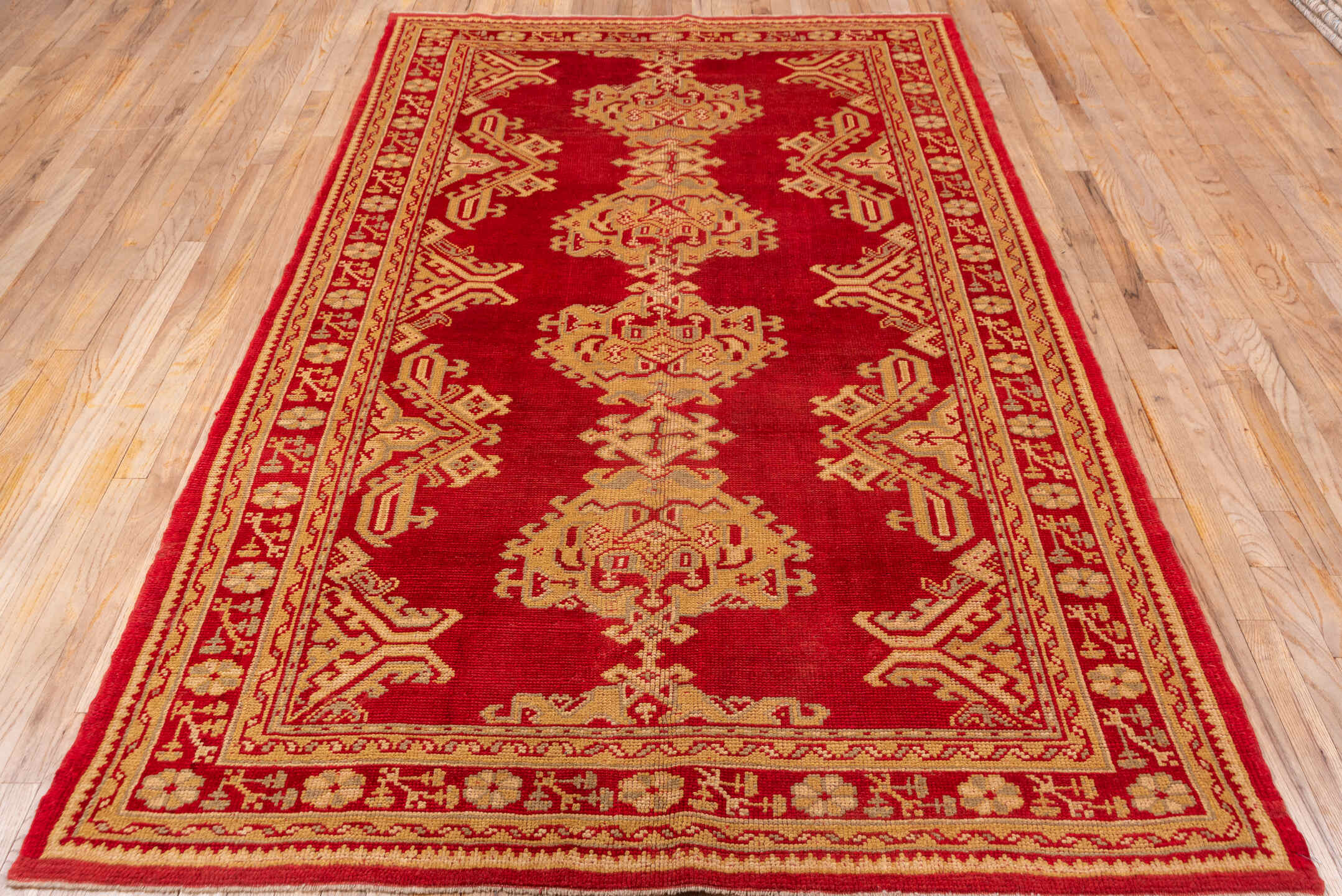 5' x 9' one-of-a-kind handmade antique Oushak medium size rug. Color palette: red, ivory, camel, rust, beige, terracotta