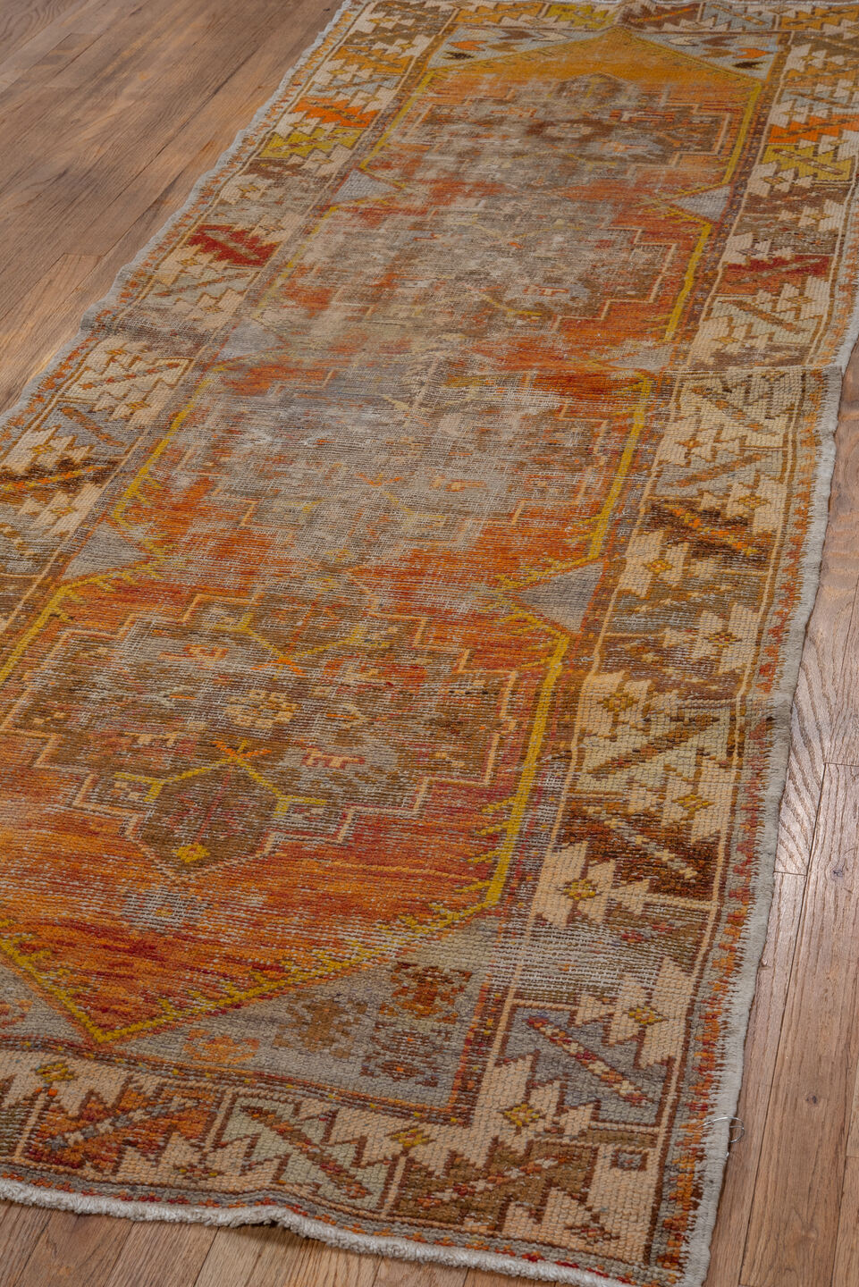 2' x 8' one-of-a-kind handmade vintage Oushak runner rug. Color palette: brown, gray, light gray, off-white, orange, pink