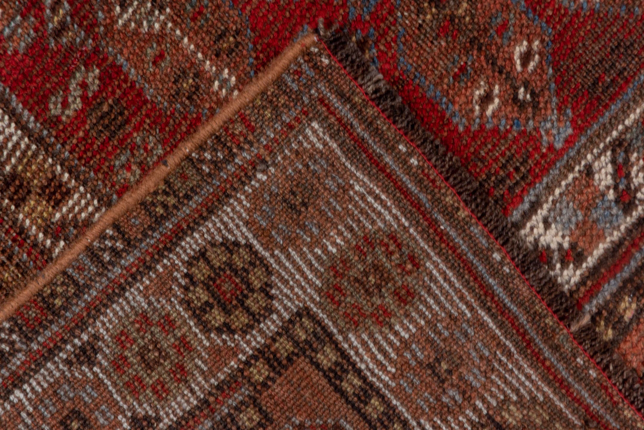 5' x 11' one-of-a-kind handmade vintage Shiraz runner rug. Color palette: rust, brown, ivory, burgundy, taupe, charcoal