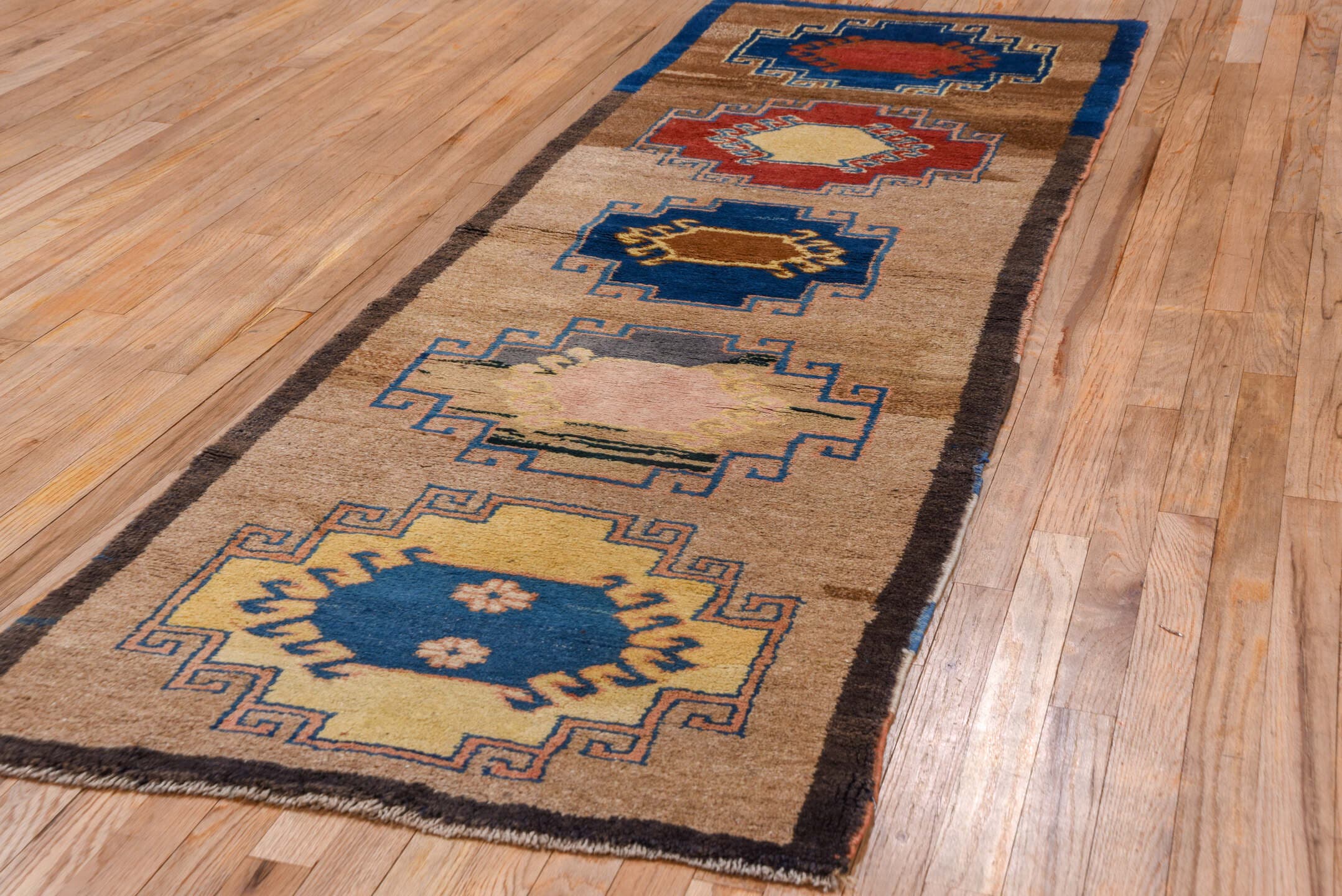 2' x 8' one-of-a-kind handmade antique Gabbe runner rug. Color palette: camel, navy, brown, rust, ivory, blue, blush, taupe