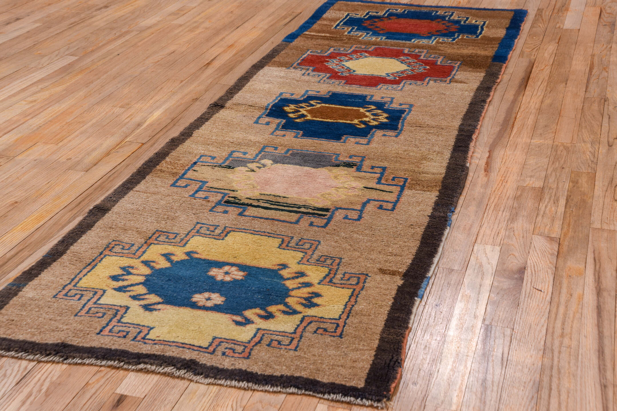 2' x 8' one-of-a-kind handmade antique Gabbe runner rug. Color palette: camel, navy, brown, rust, ivory, blue, blush, taupe