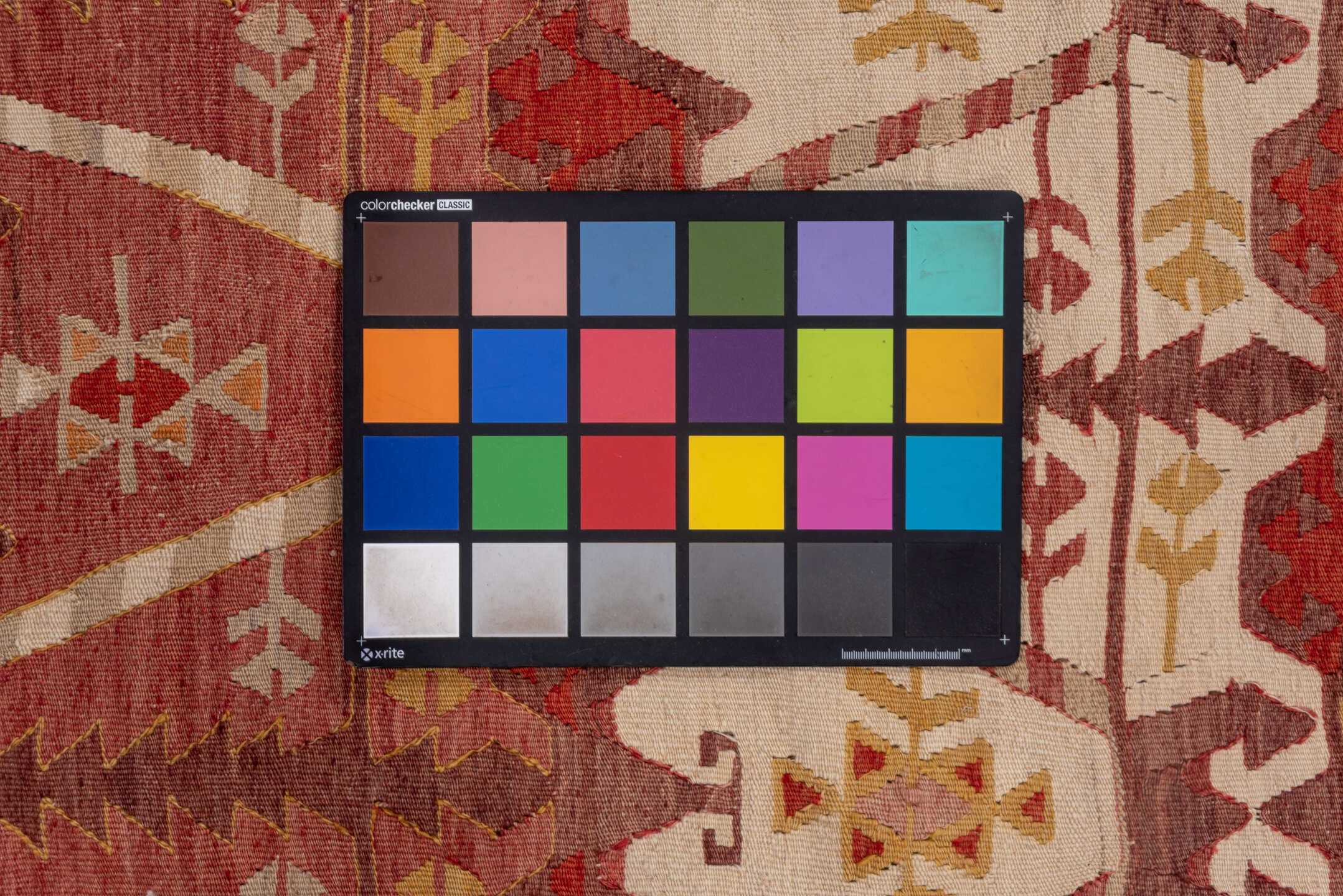 4' x 12' one-of-a-kind handmade vintage Kilim runner rug. Color palette: brown, red, redwood