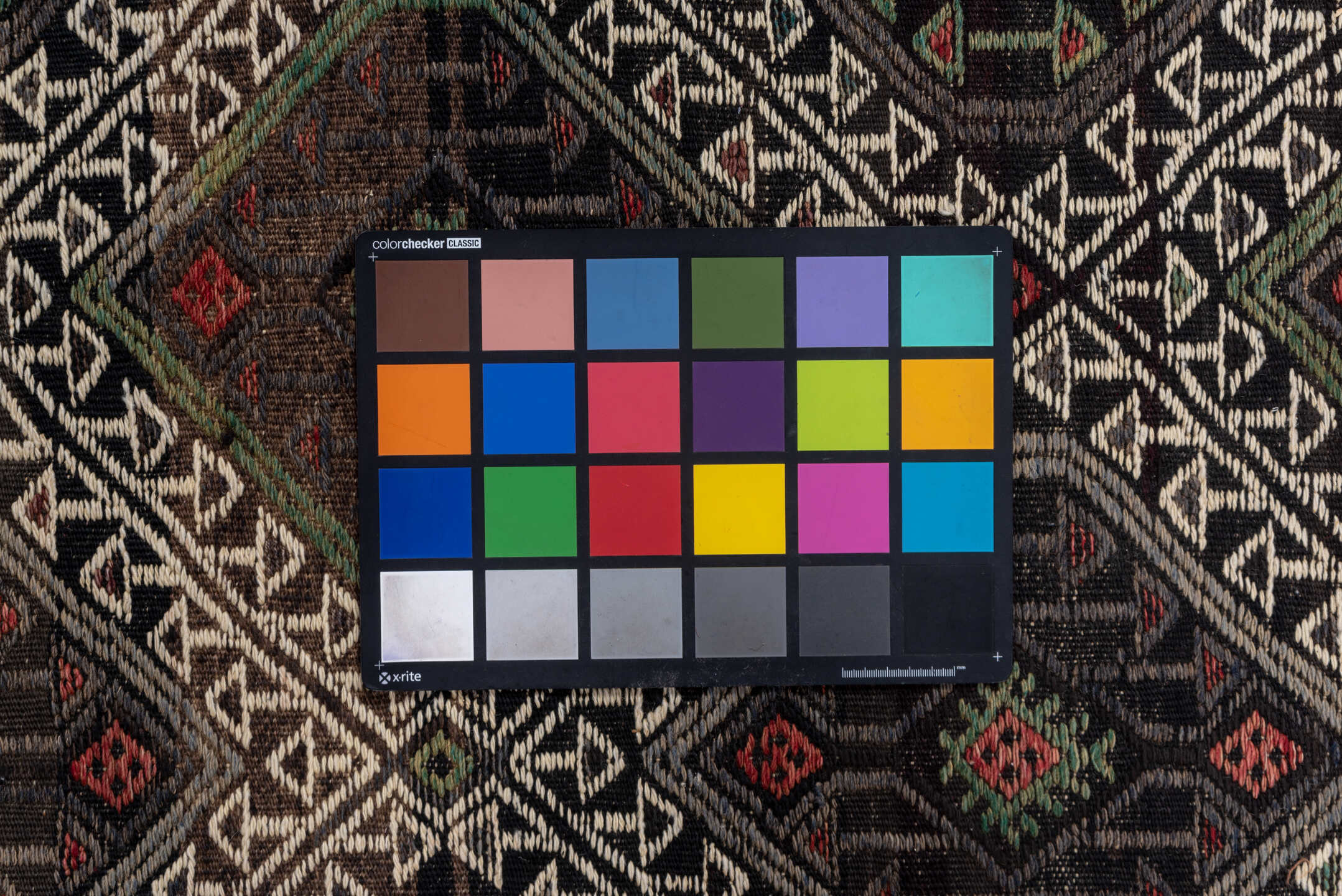 4' x 8' one-of-a-kind handmade vintage Jijim rug. Color palette: black, brown, dim gray, gray, light gray, red