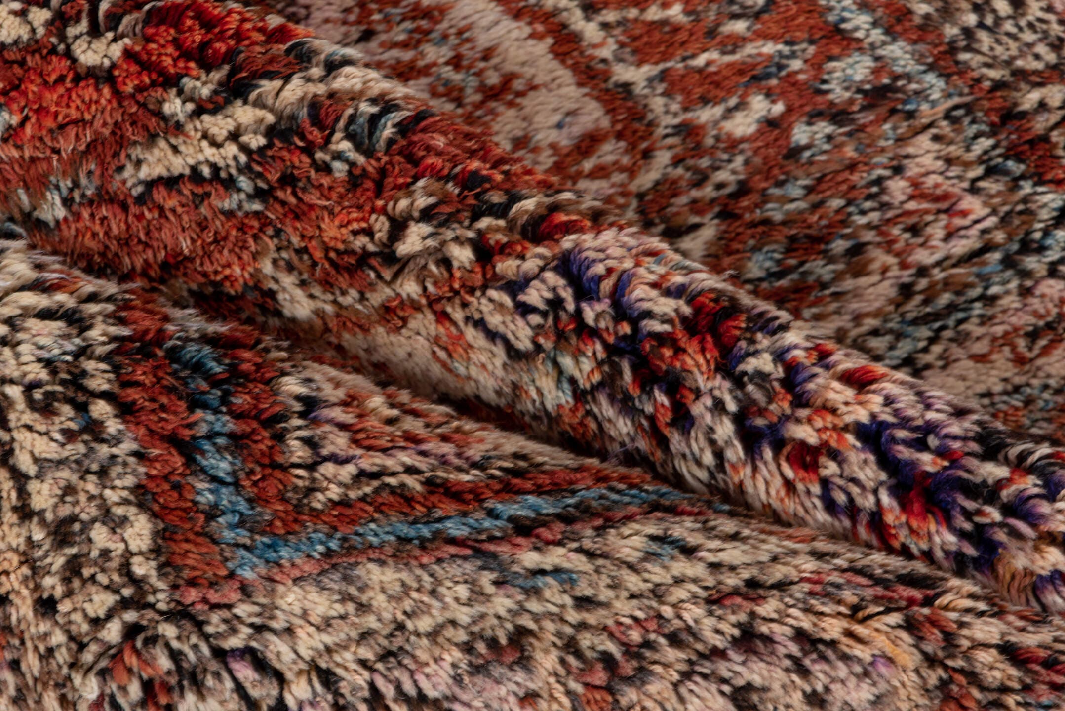 4' x 5' one-of-a-kind handmade vintage Tulu small size rug. Color palette: ivory, rust, charcoal, soft blue, terracotta