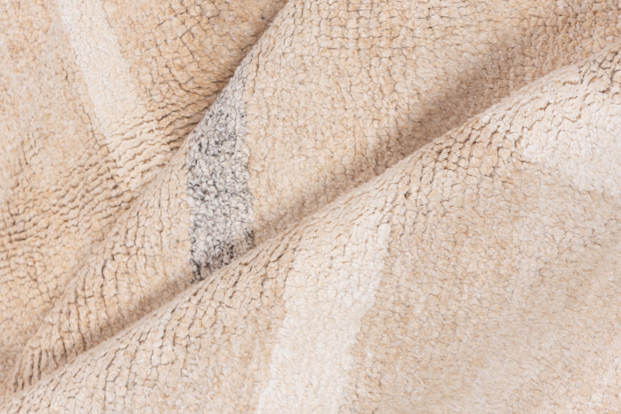8' x 9' one-of-a-kind handmade handmade Contemporary rug. Color palette: beige, ivory, cream, taupe, gray