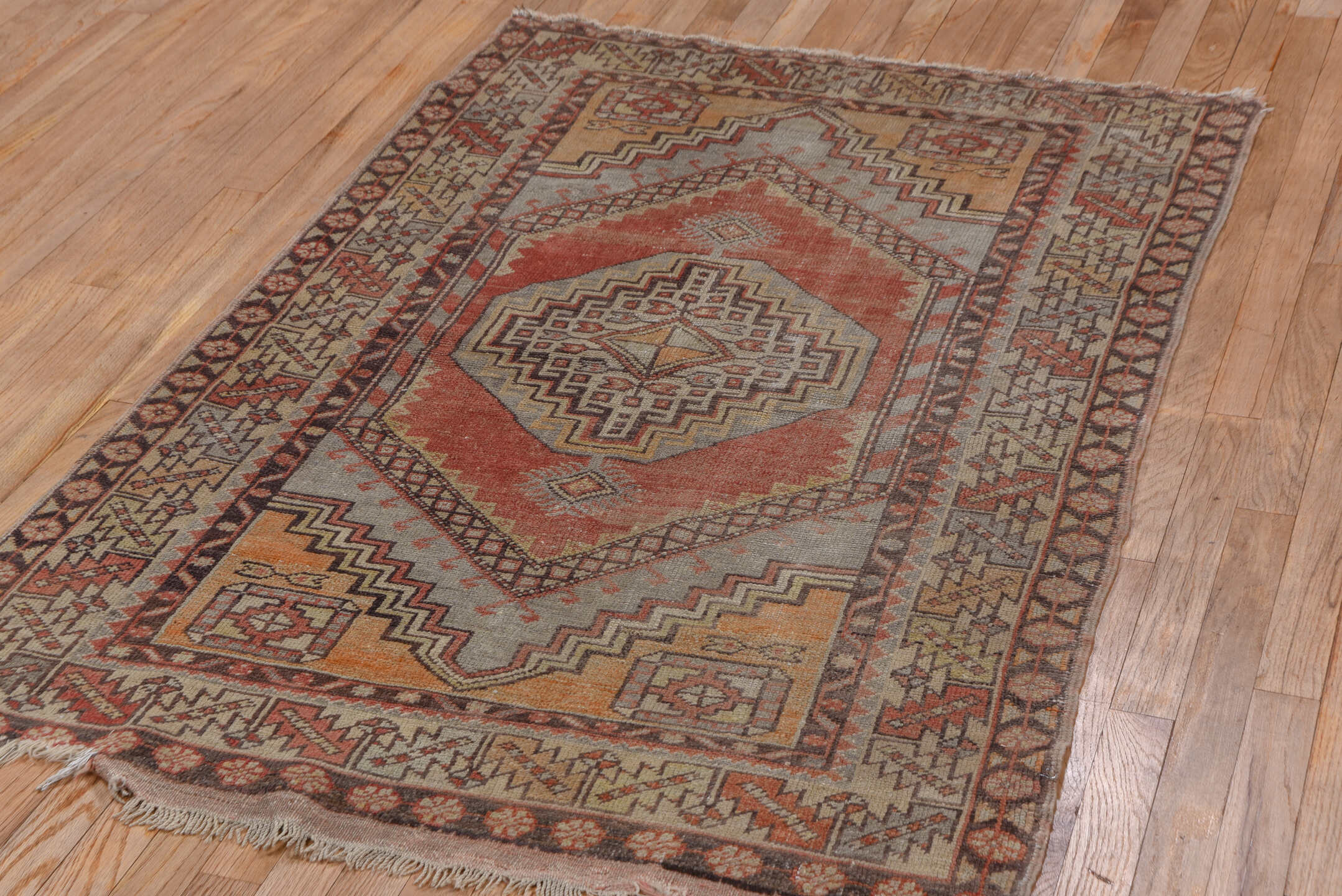 3' x 5' one-of-a-kind handmade vintage Oushak small size rug. Color palette: brown, gray, light gray, off-white, pink, red