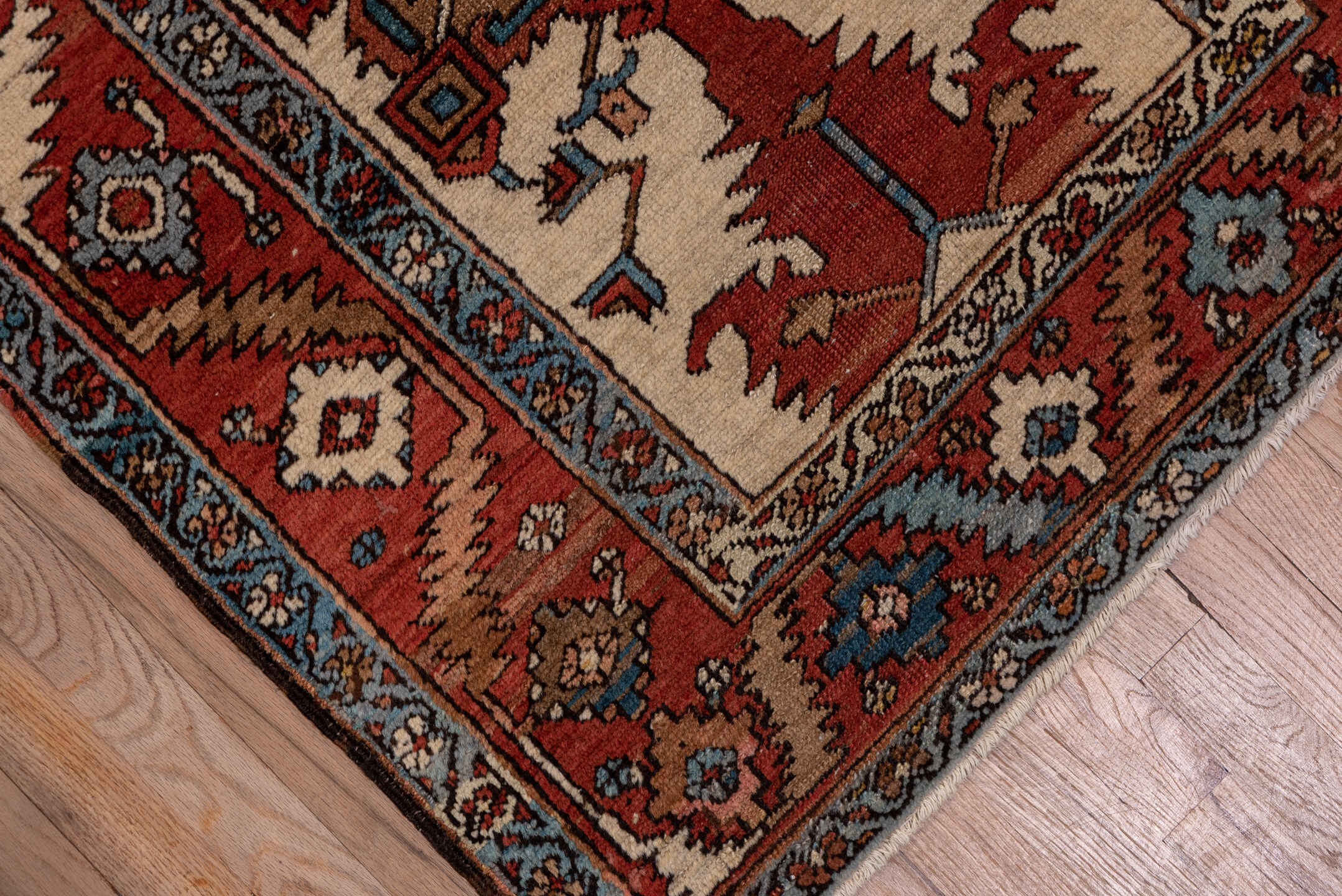 3' x 17' one-of-a-kind handmade vintage Serapi runner rug. Color palette: rust, ivory, sky blue, navy, camel, brown