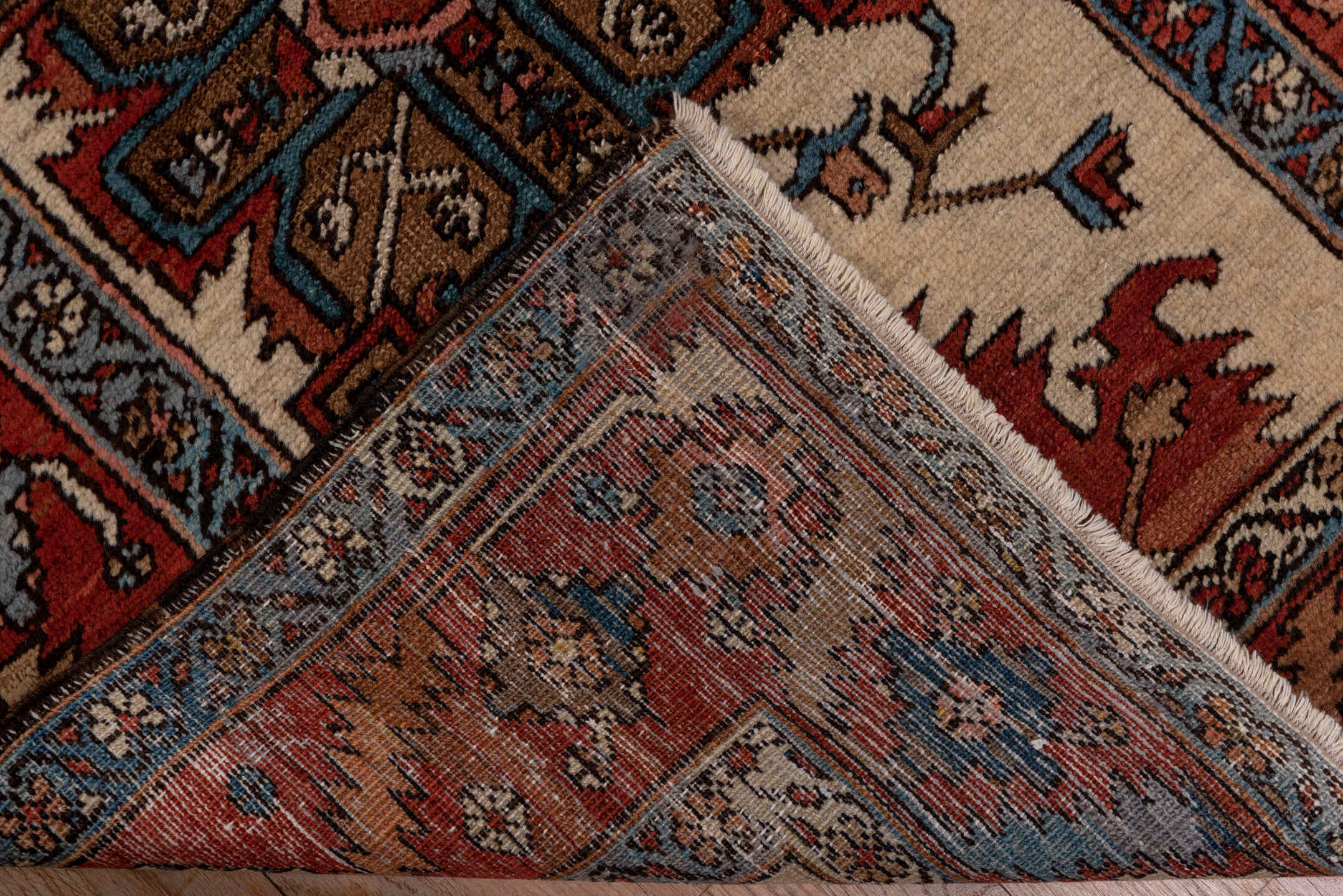 3' x 17' one-of-a-kind handmade vintage Serapi runner rug. Color palette: rust, ivory, sky blue, navy, camel, brown