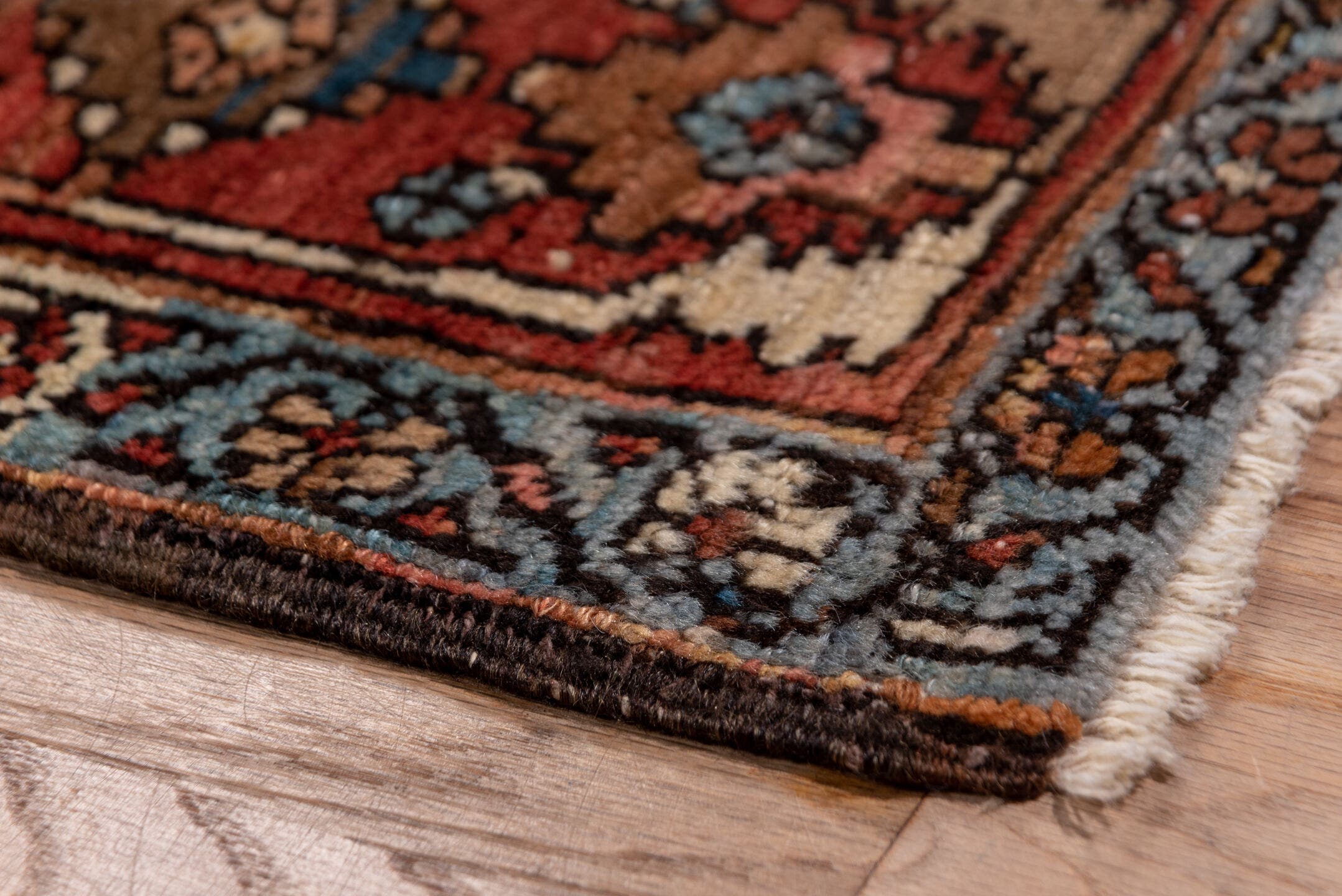 3' x 17' one-of-a-kind handmade vintage Serapi runner rug. Color palette: rust, ivory, sky blue, navy, camel, brown