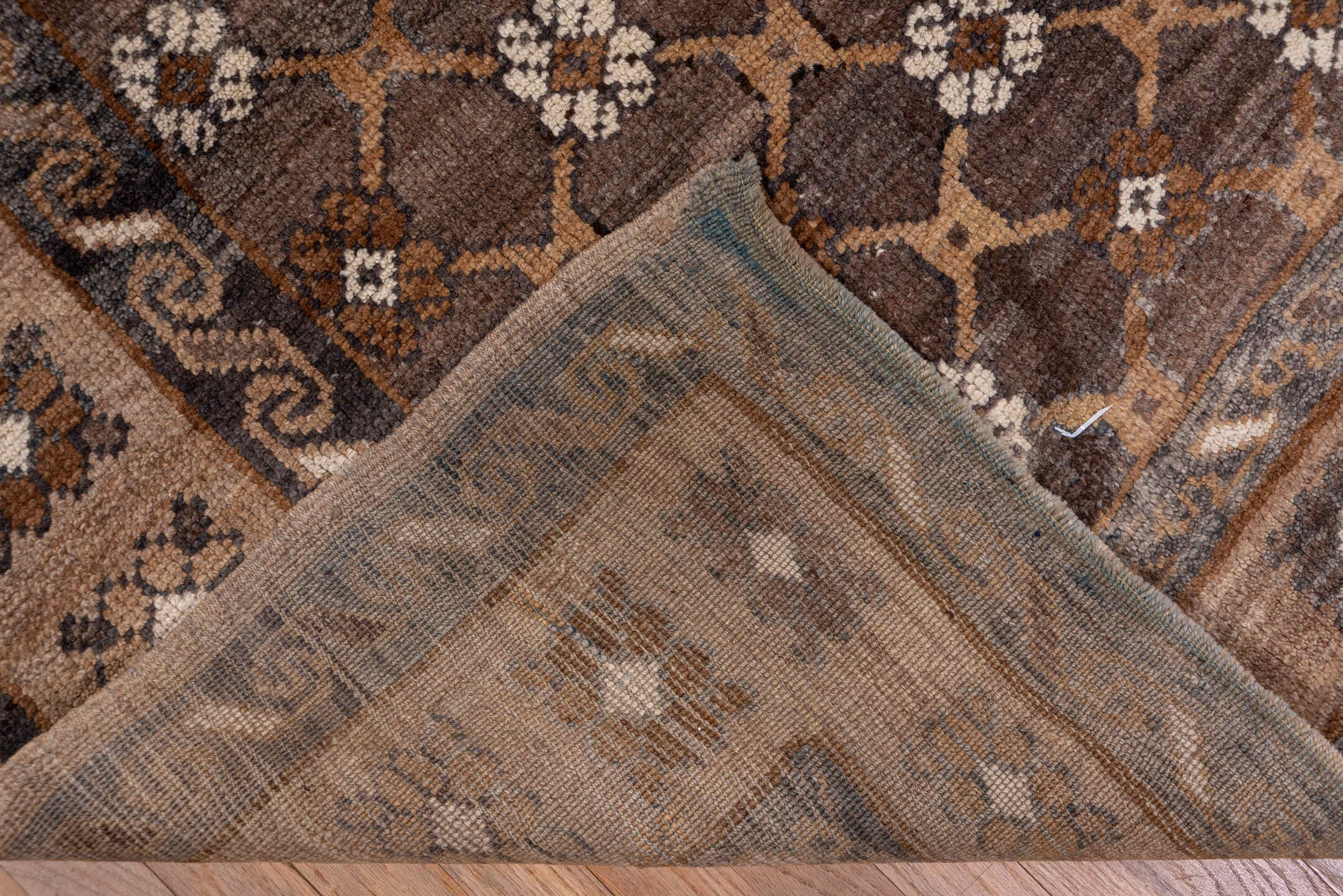 7' x 11' one-of-a-kind handmade antique Kars large size rug. Color palette: taupe, brown, camel, ivory, charcoal, beige