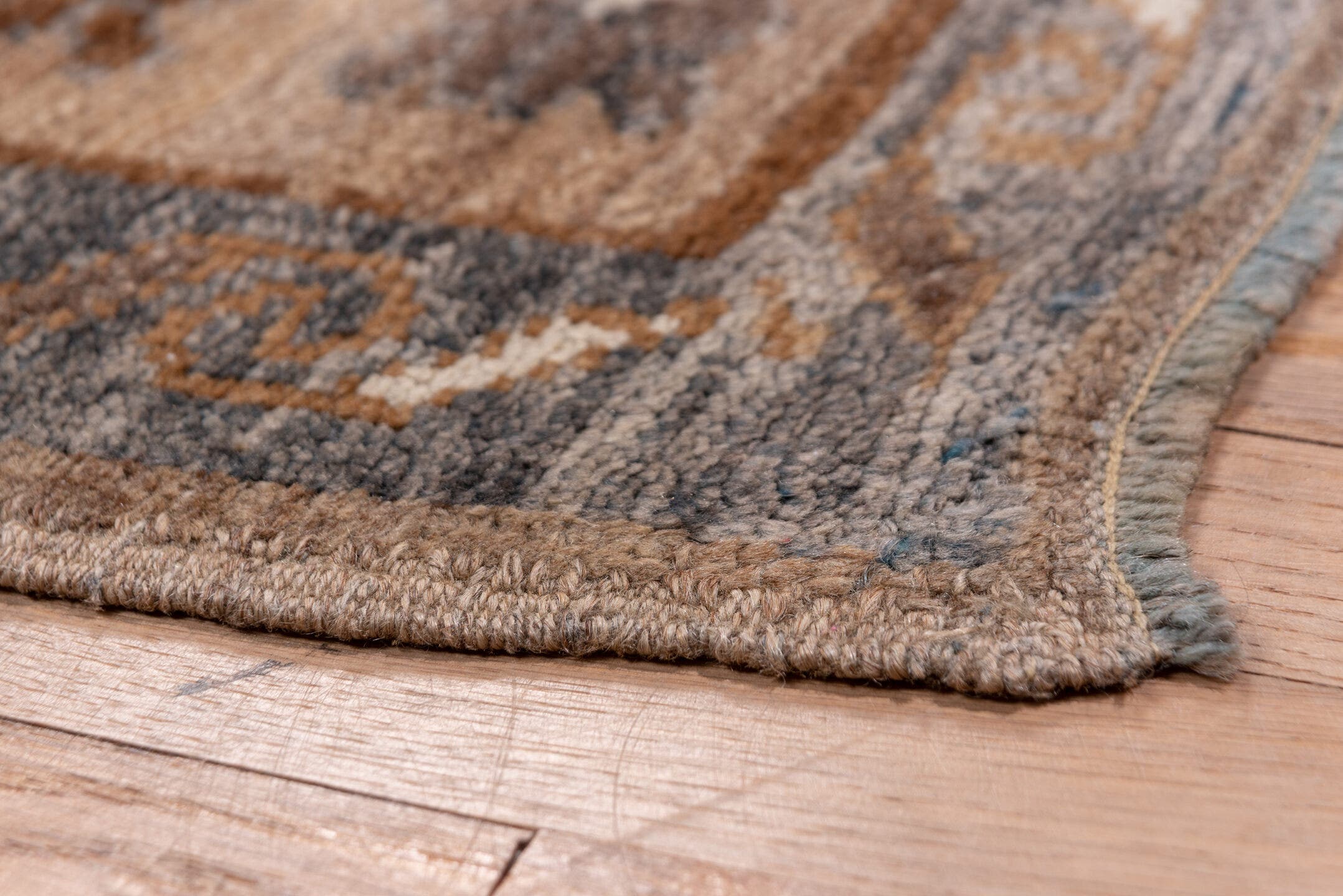 7' x 11' one-of-a-kind handmade antique Kars large size rug. Color palette: taupe, brown, camel, ivory, charcoal, beige