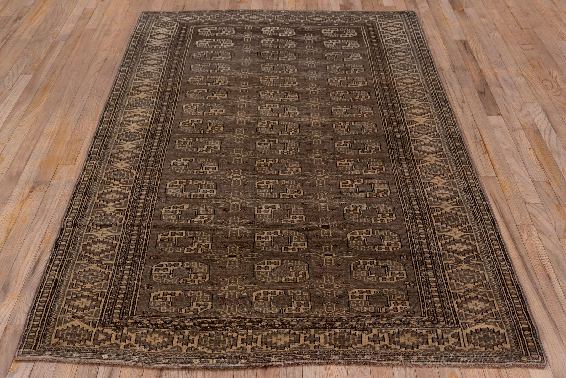 4' x 7' one-of-a-kind handmade vintage Afghan rug. Color palette: brown, gray, pink