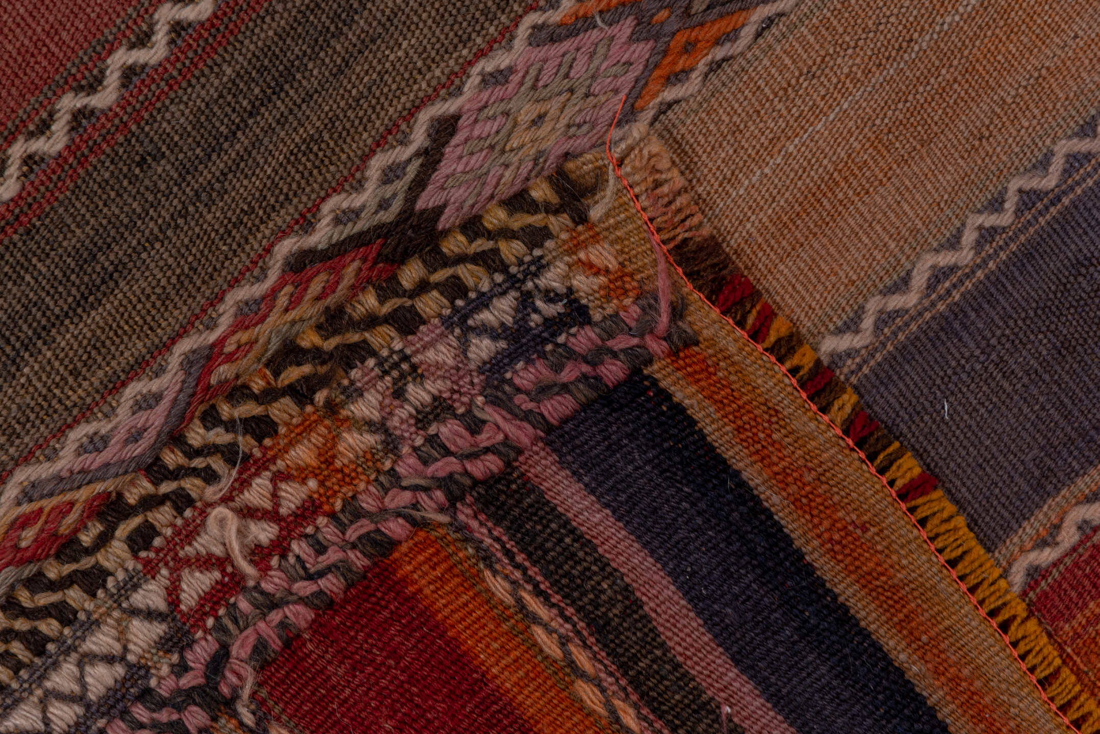 4' x 10' one-of-a-kind handmade vintage Jijim runner rug. Color palette: rust, rose, taupe, brown, charcoal, terracotta