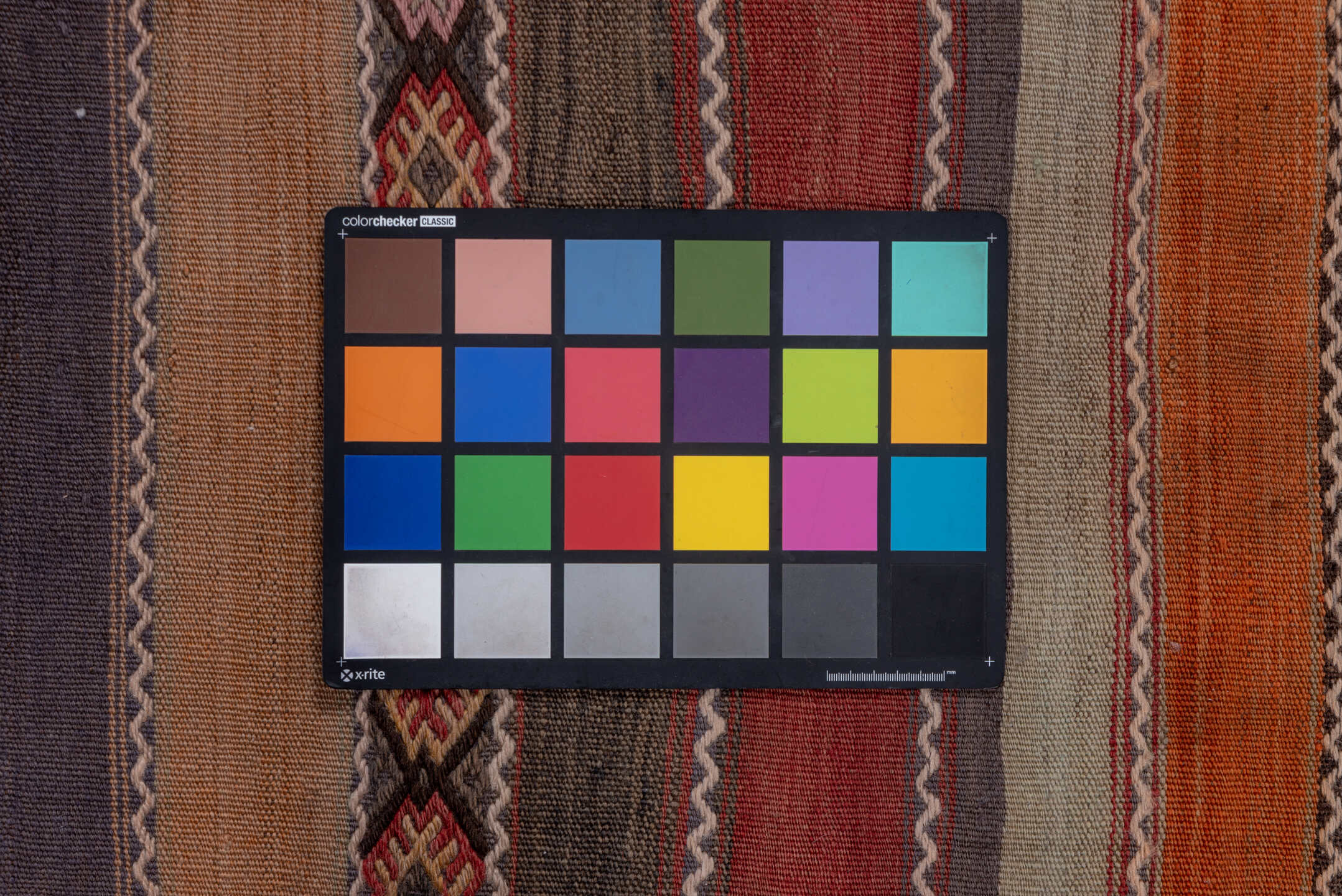 4' x 10' one-of-a-kind handmade vintage Jijim runner rug. Color palette: rust, rose, taupe, brown, charcoal, terracotta