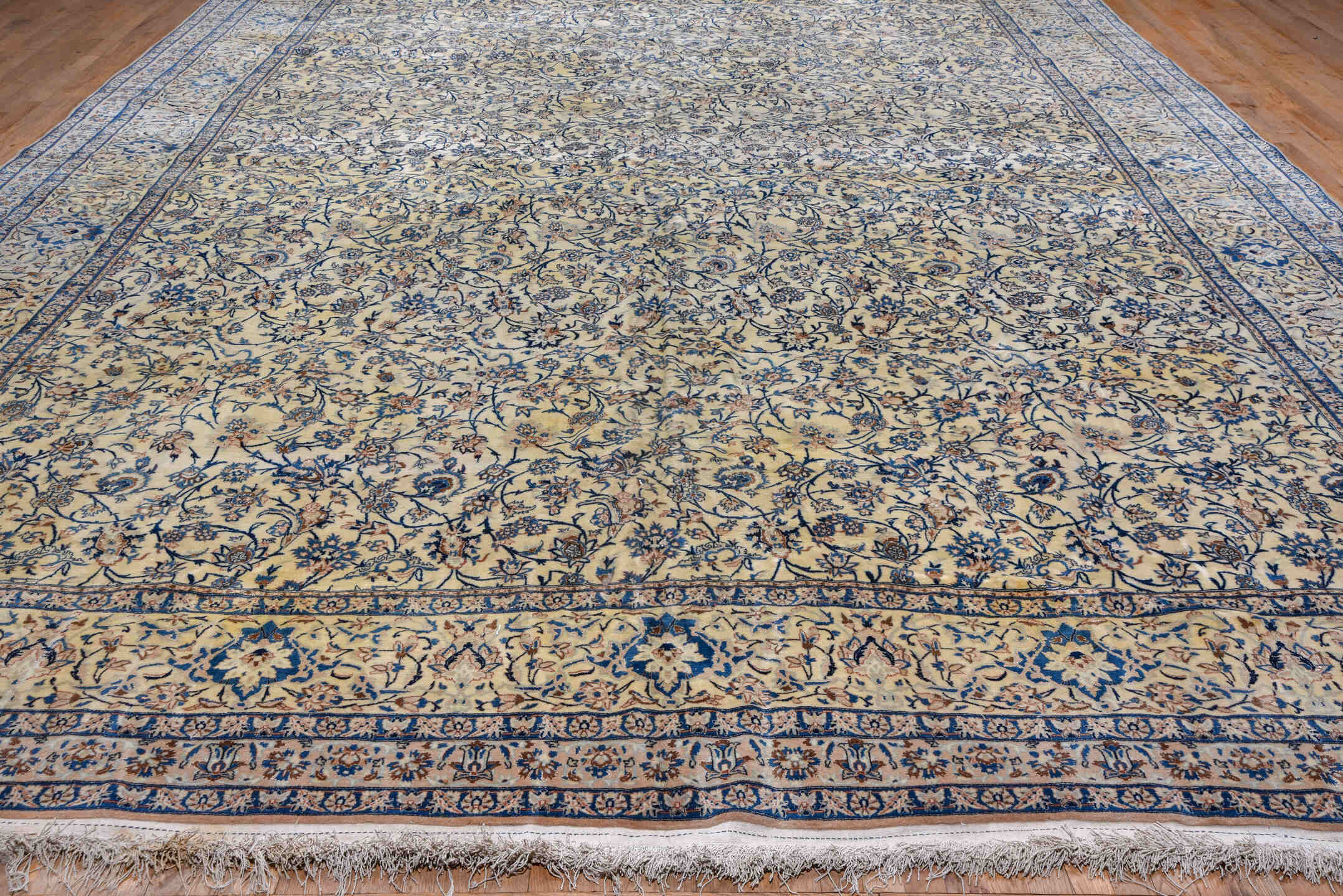 13' x 19' one-of-a-kind handmade vintage Naiin oversize rug. Color palette: ivory, blue, navy, beige, camel, taupe, gray