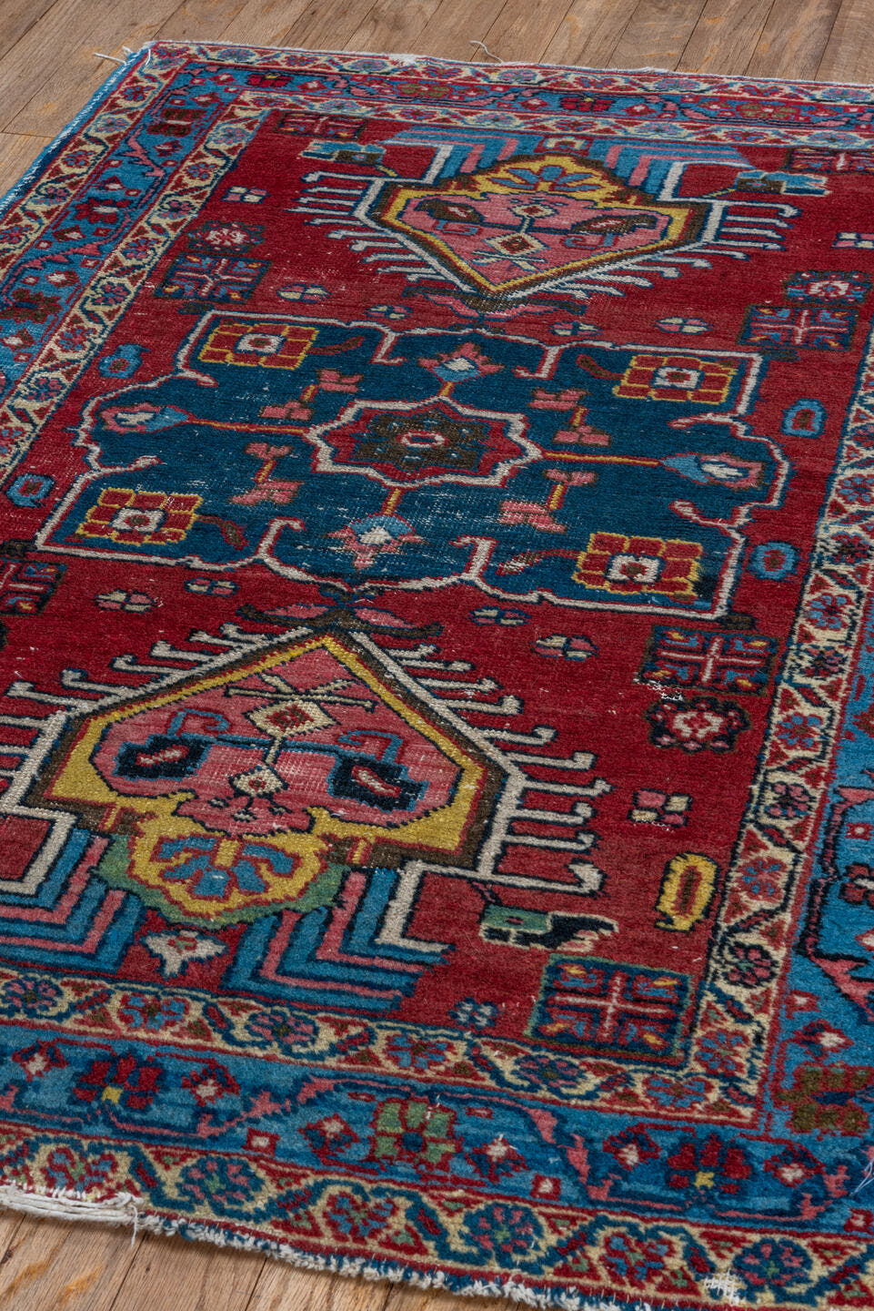 2' x 3' one-of-a-kind handmade antique Heriz small size rug. Color palette: red, sky_blue, ivory, navy, pink, gold, black