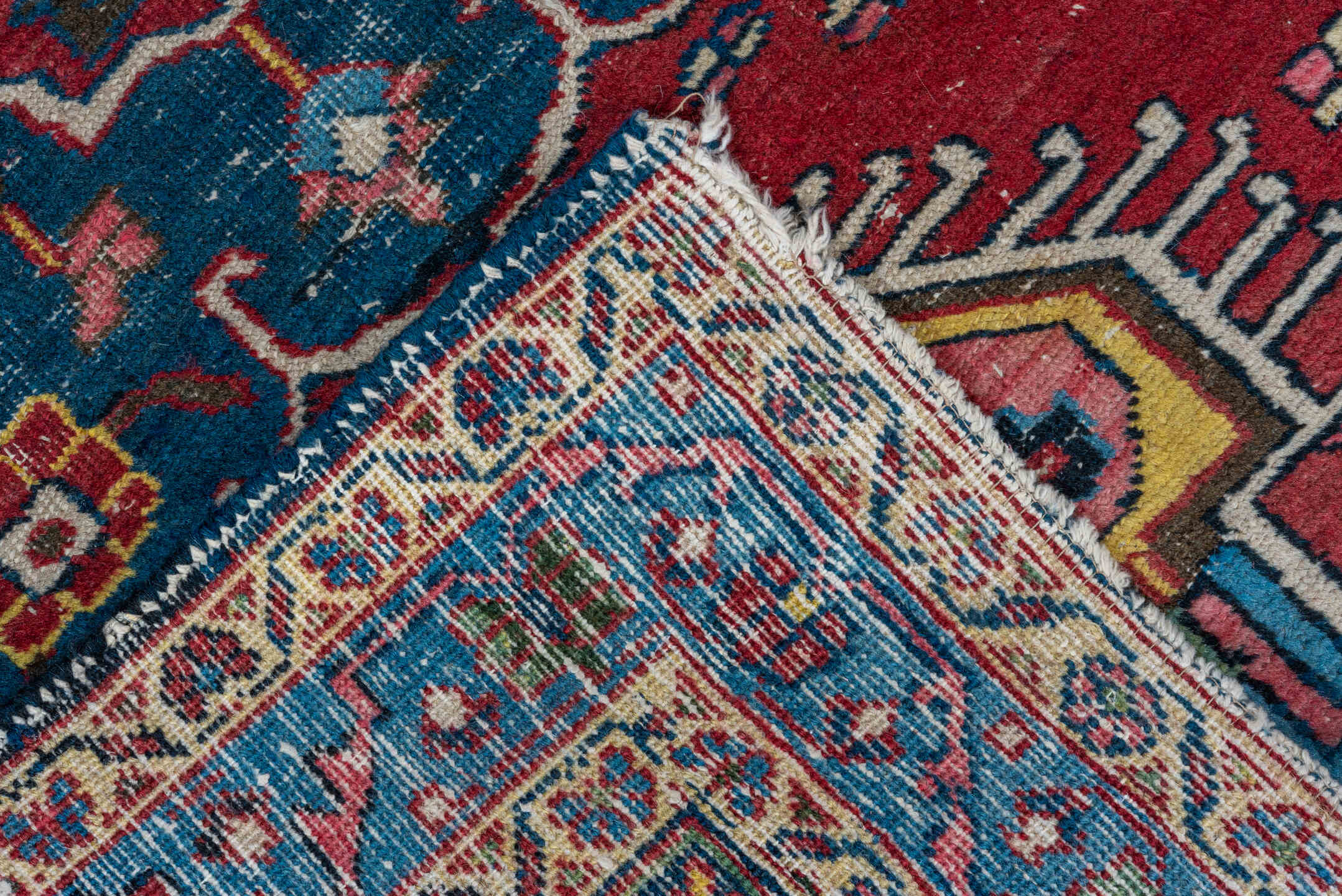 2' x 3' one-of-a-kind handmade antique Heriz small size rug. Color palette: red, sky_blue, ivory, navy, pink, gold, black