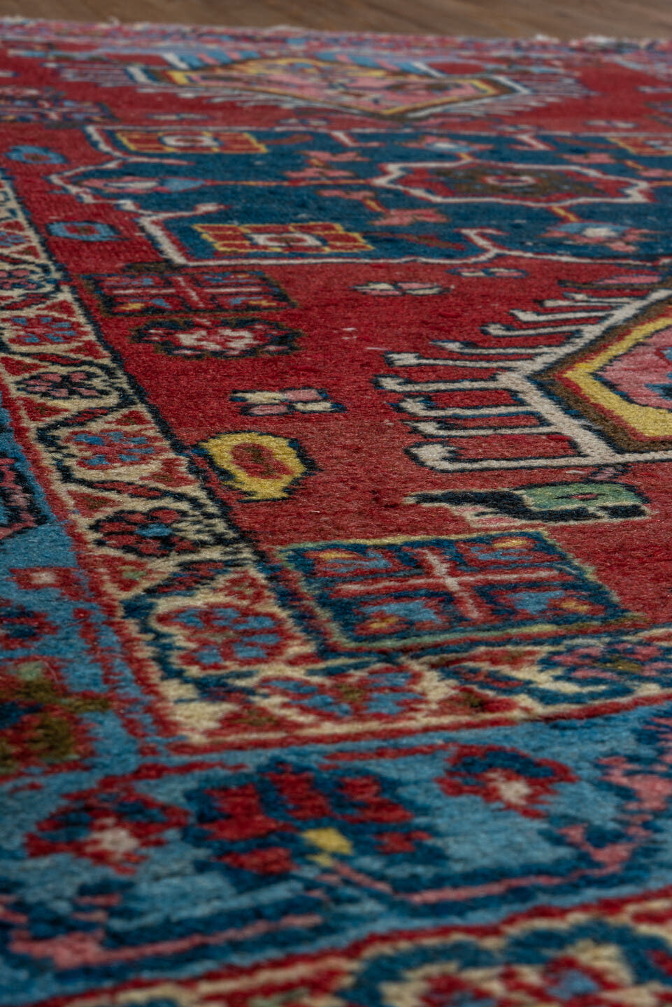 2' x 3' one-of-a-kind handmade antique Heriz small size rug. Color palette: red, sky_blue, ivory, navy, pink, gold, black