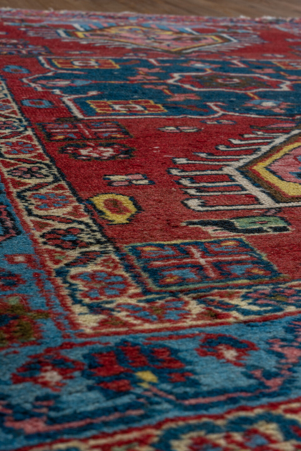 2' x 3' one-of-a-kind handmade antique Heriz small size rug. Color palette: red, sky_blue, ivory, navy, pink, gold, black
