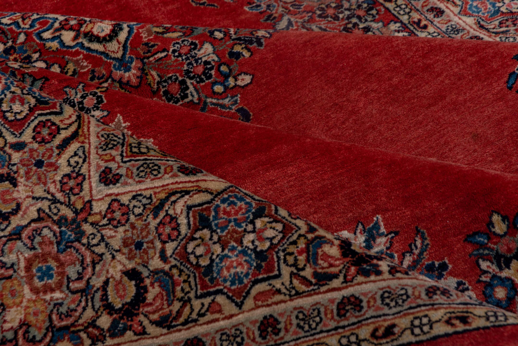 6' x 9' one-of-a-kind handmade antique Sarouk medium size rug. Color palette: red, ivory, navy, rose, slate, rust, camel