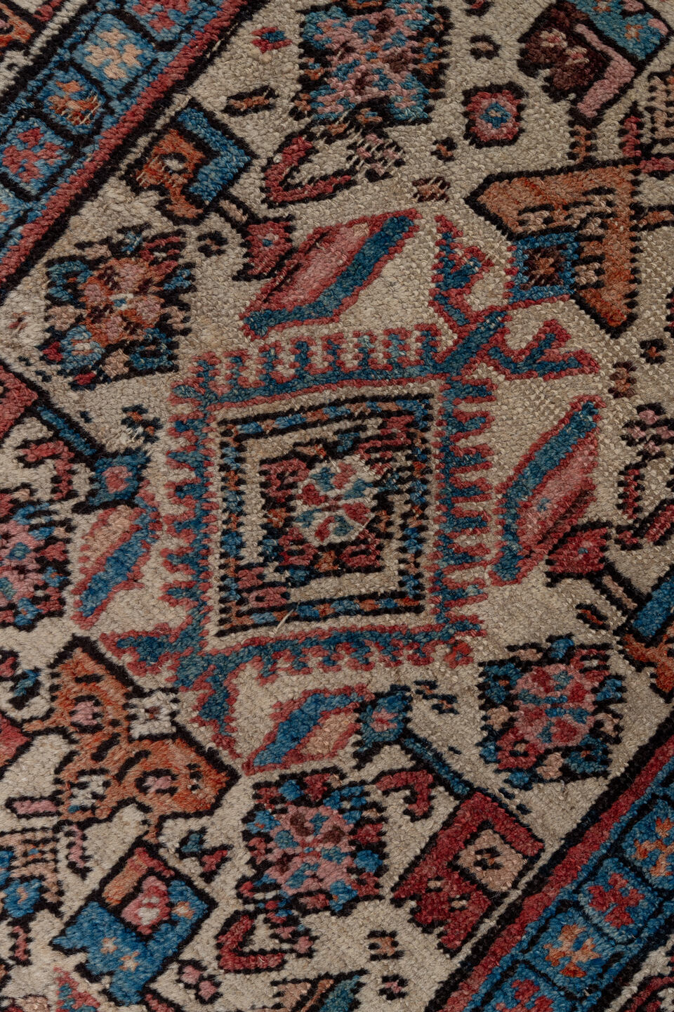 3' x 13' one-of-a-kind handmade antique Sarab runner rug. Color palette: ivory, rust, indigo, burgundy, camel, slate