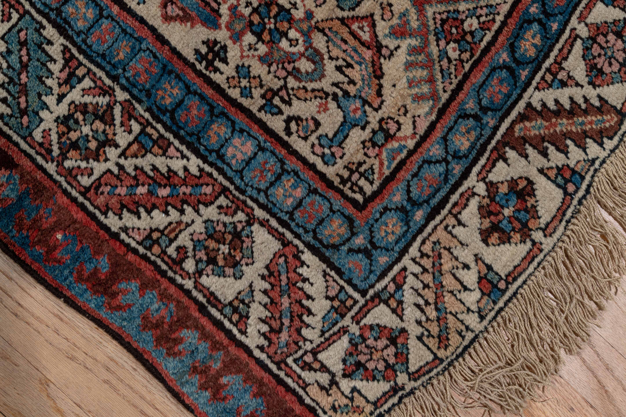 3' x 13' one-of-a-kind handmade antique Sarab runner rug. Color palette: ivory, rust, indigo, burgundy, camel, slate