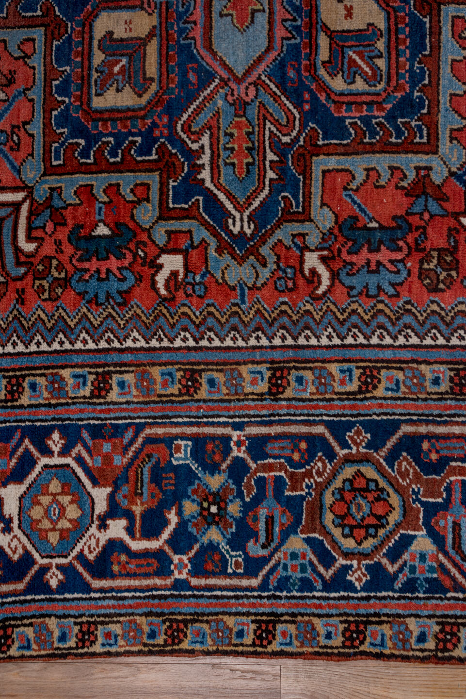 8' x 11' one-of-a-kind handmade antique Heriz large size rug. Color palette: rust, navy, ivory, sky blue, slate, camel