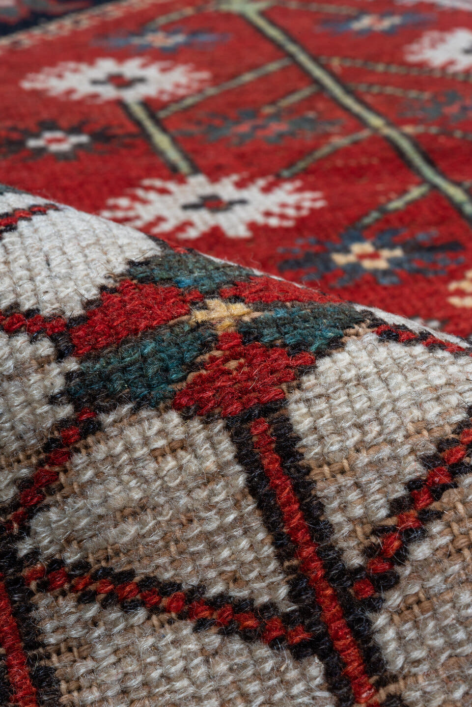 4' x 6' one-of-a-kind handmade antique Baktiary small size rug. Color palette: rust, ivory, navy, slate, burgundy, camel