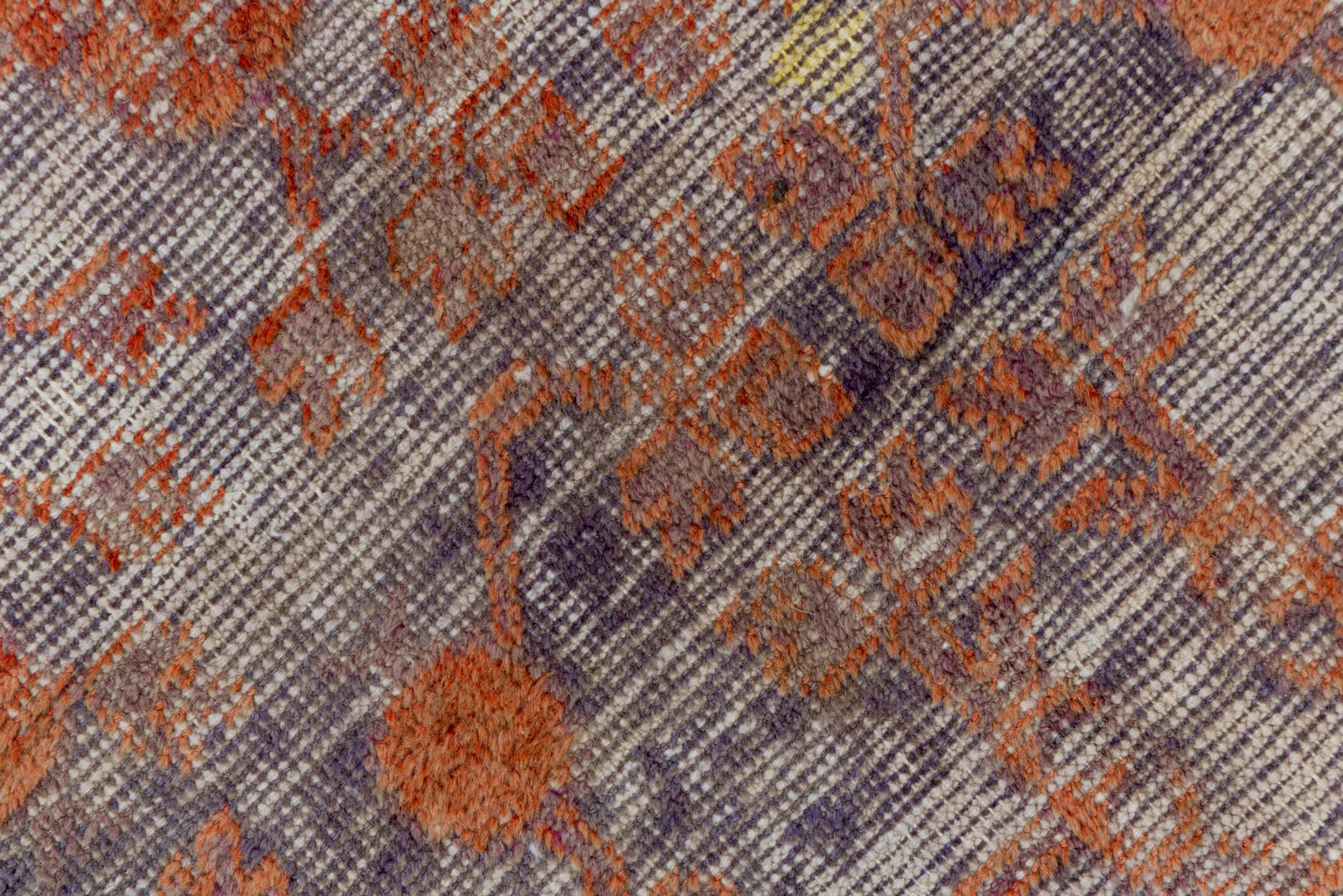 6' x 11' one-of-a-kind handmade antique Khotan large size rug. Color palette: lavender, rust, plum, gold, taupe, rose