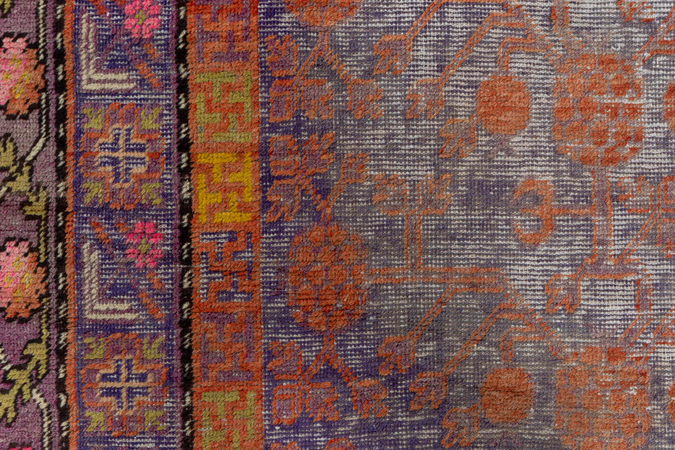 6' x 11' one-of-a-kind handmade antique Khotan large size rug. Color palette: lavender, rust, plum, gold, taupe, rose