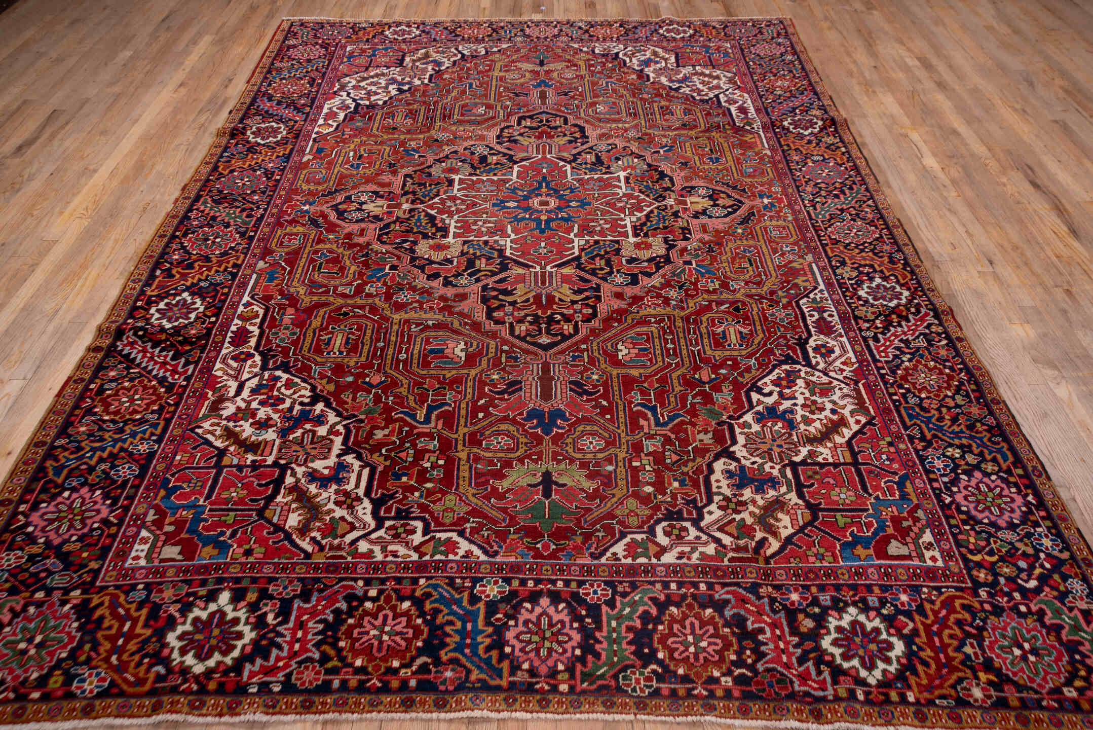 8' x 12' one-of-a-kind handmade vintage Heriz large size rug. Color palette: blue, brown, dim gray, gray, pink, red, redwood