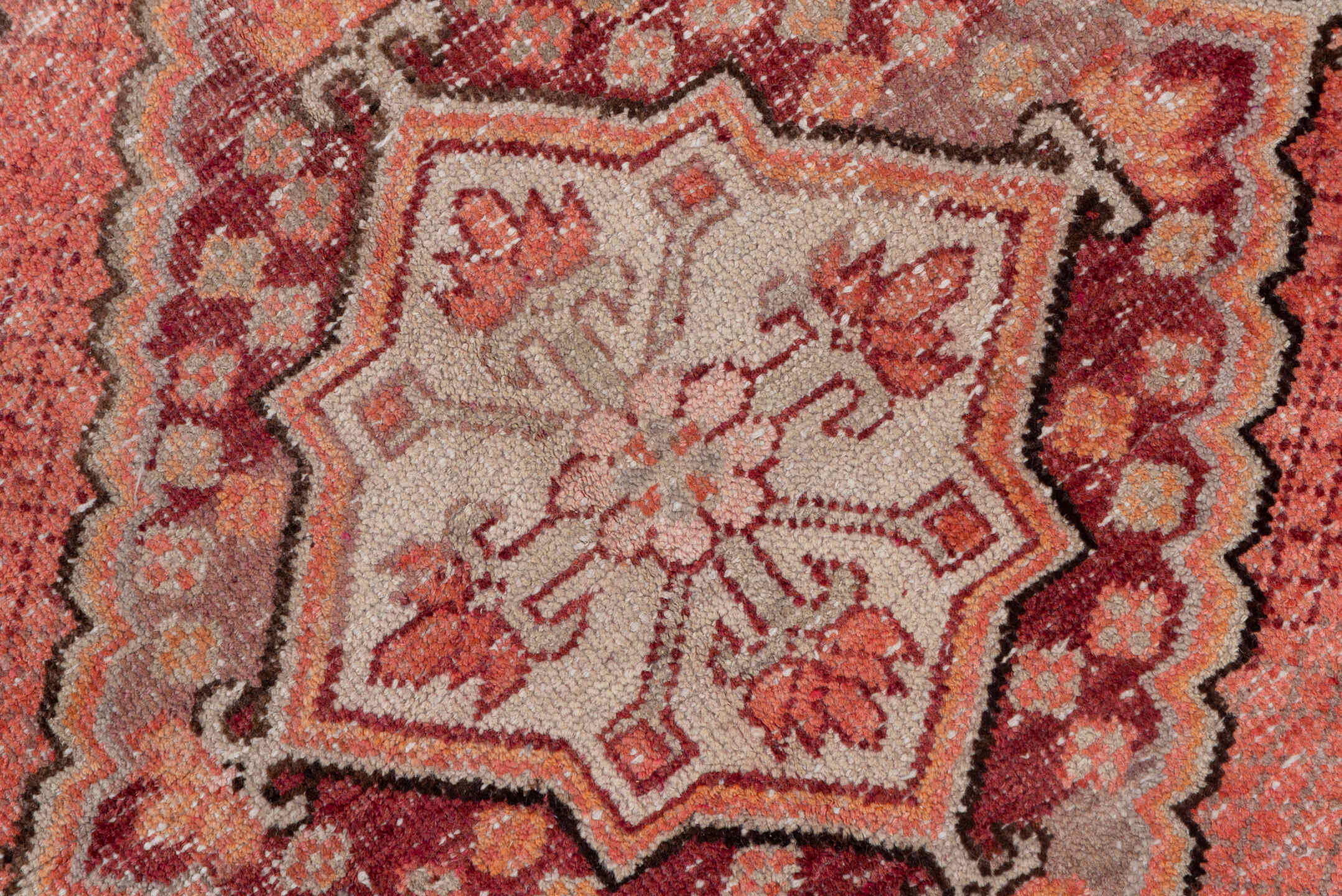 4' x 8' one-of-a-kind handmade vintage Khotan rug. Color palette: brown, gray, pink, red, redwood