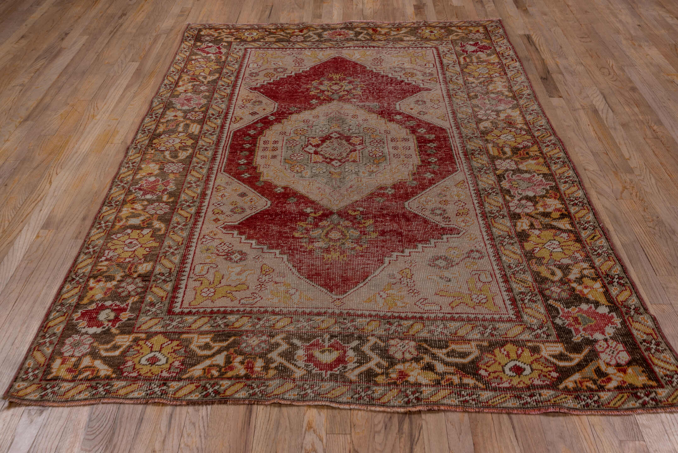 5' x 8' one-of-a-kind handmade vintage Oushak medium size rug. Color palette: rose, ivory, brown, taupe, gold, sage