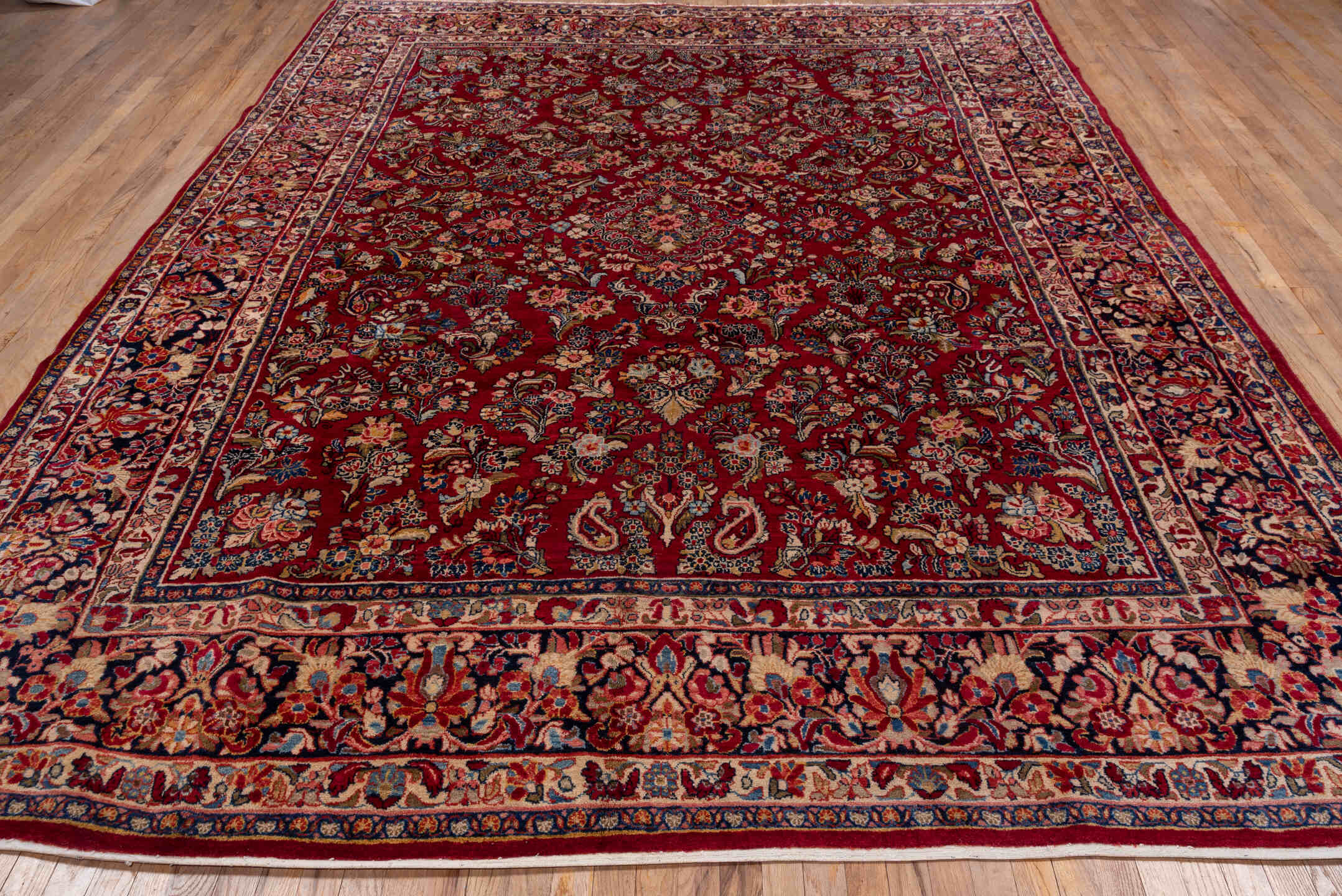 8' x 11' one-of-a-kind handmade antique Sarouk large size rug. Color palette: red, navy, ivory, rose, burgundy, camel, slate