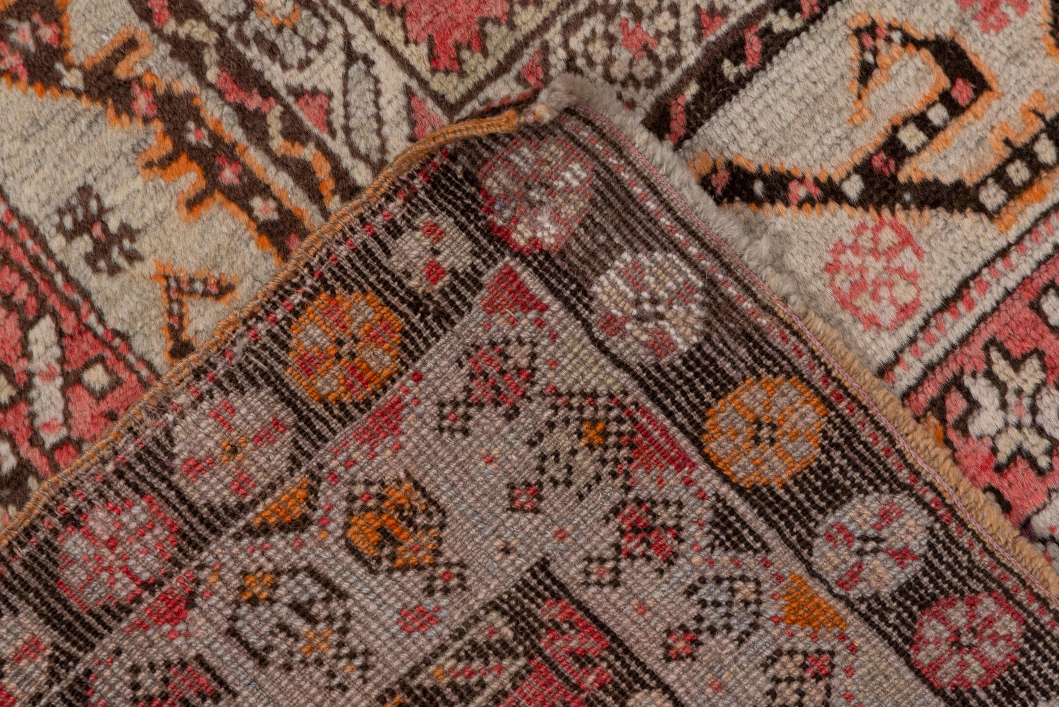 3' x 10' one-of-a-kind handmade antique Sivas runner rug. Color palette: rose, ivory, brown, rust, charcoal, taupe, coral
