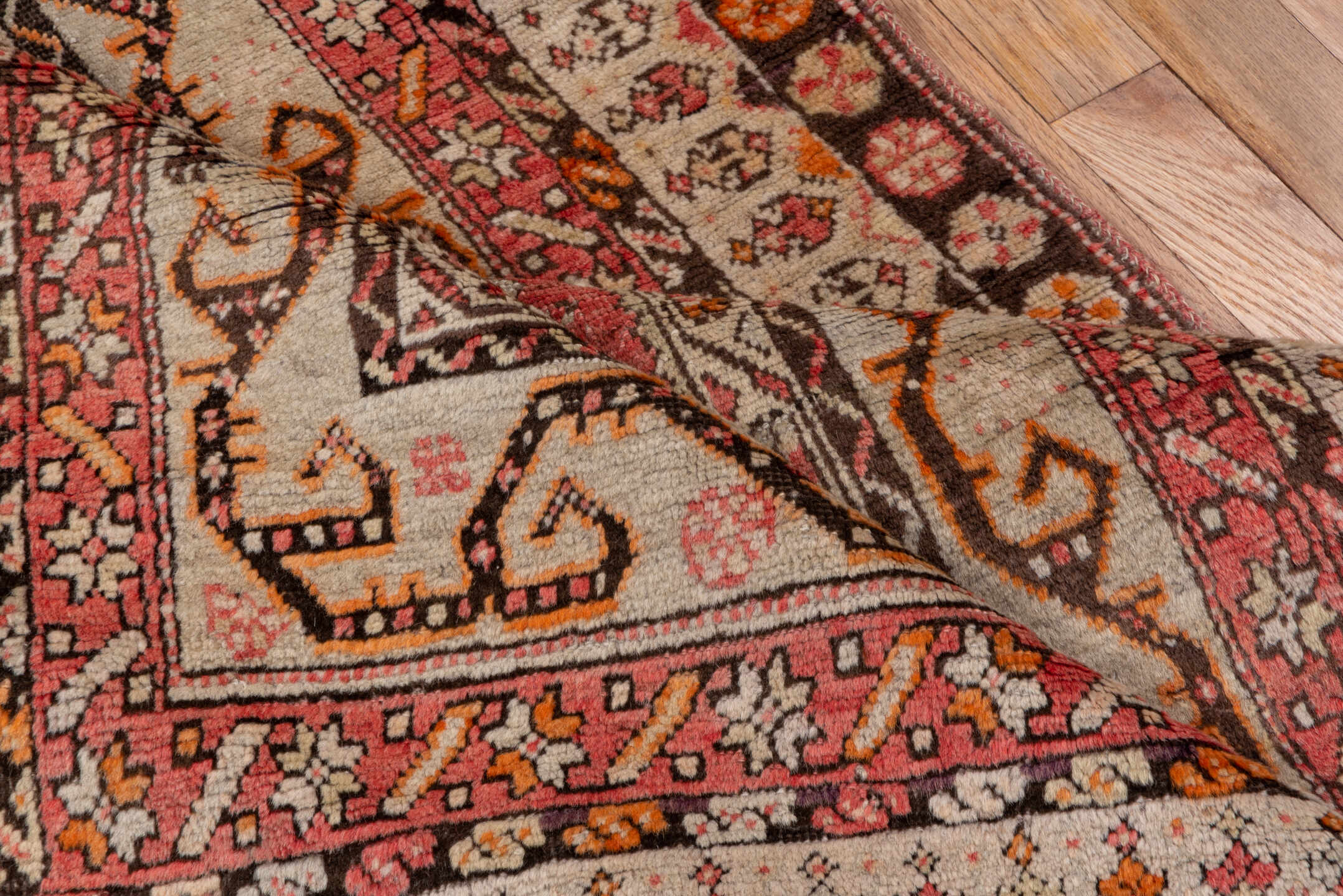 3' x 10' one-of-a-kind handmade antique Sivas runner rug. Color palette: rose, ivory, brown, rust, charcoal, taupe, coral