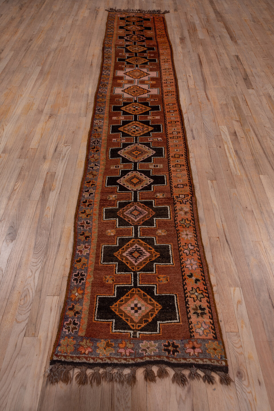 2' x 13' one-of-a-kind handmade vintage Kars runner rug. Color palette: terra cotta, brown, taupe, camel, charcoal, ivory