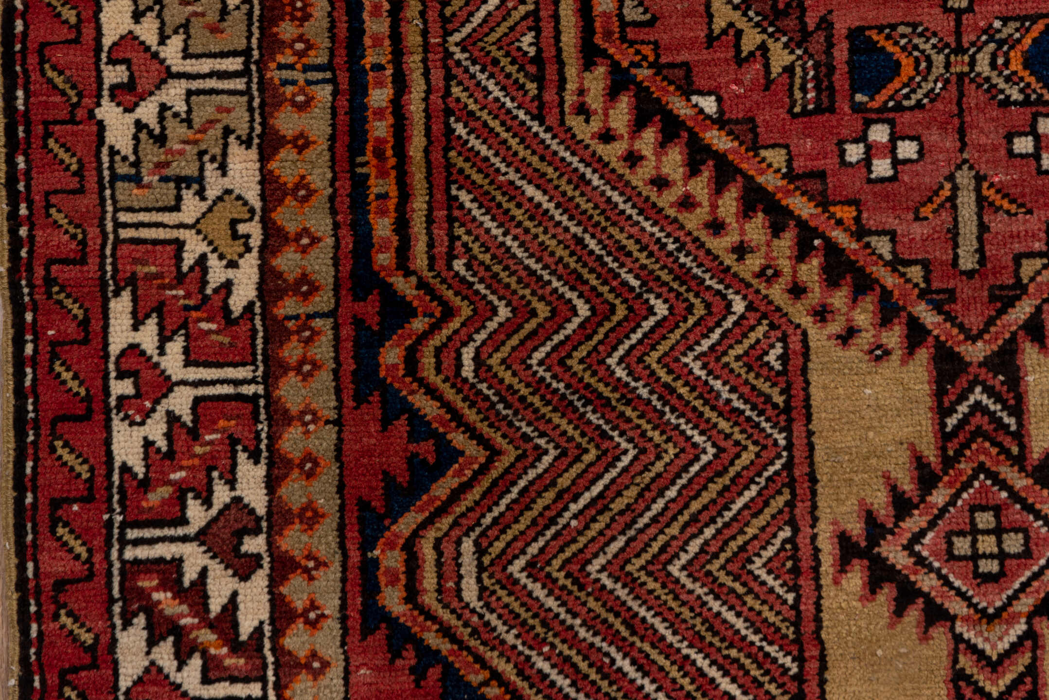 4' x 11' one-of-a-kind handmade antique Sarab runner rug. Color palette: rust, ivory, brick, navy, camel, burgundy