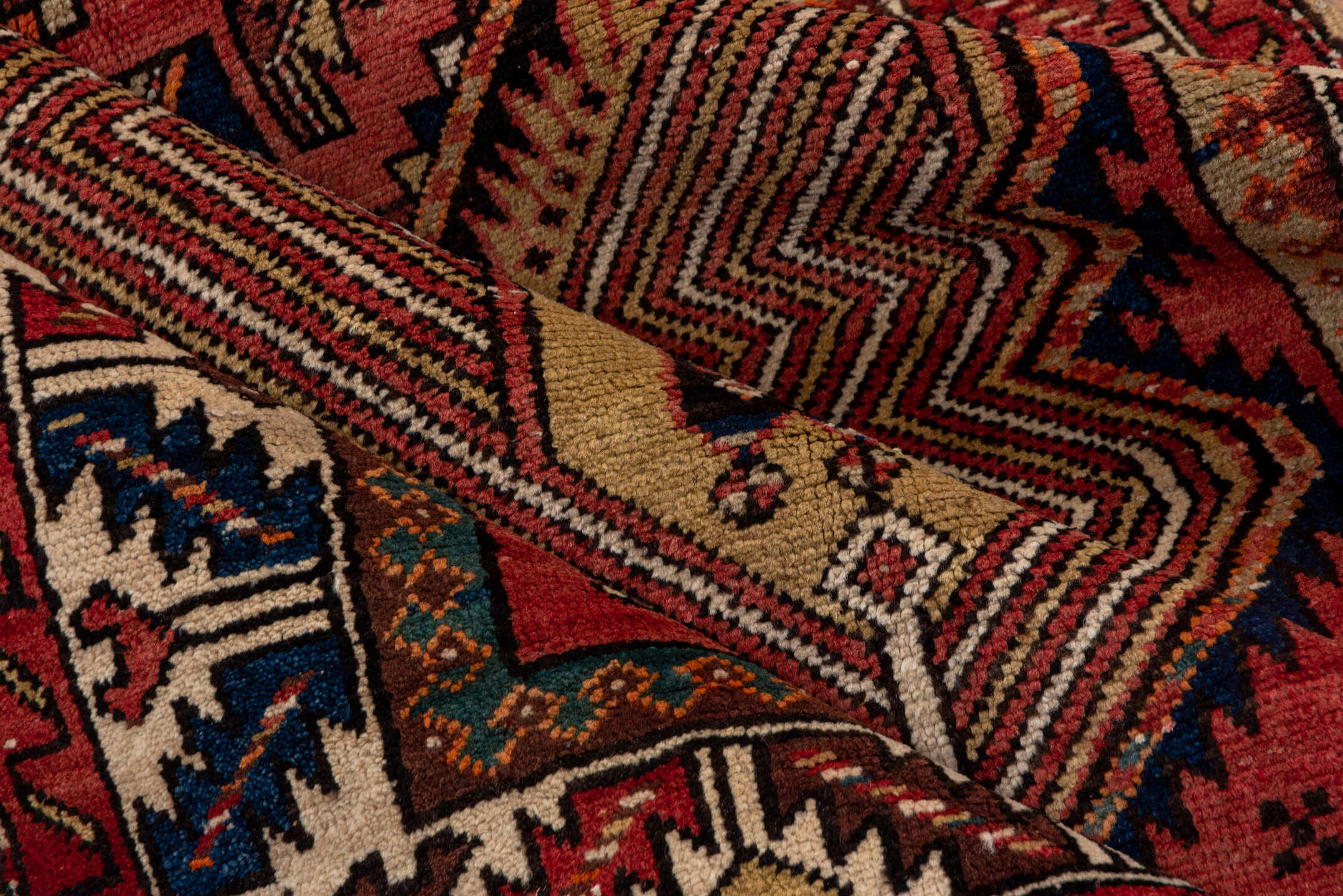 4' x 11' one-of-a-kind handmade antique Sarab runner rug. Color palette: rust, ivory, brick, navy, camel, burgundy