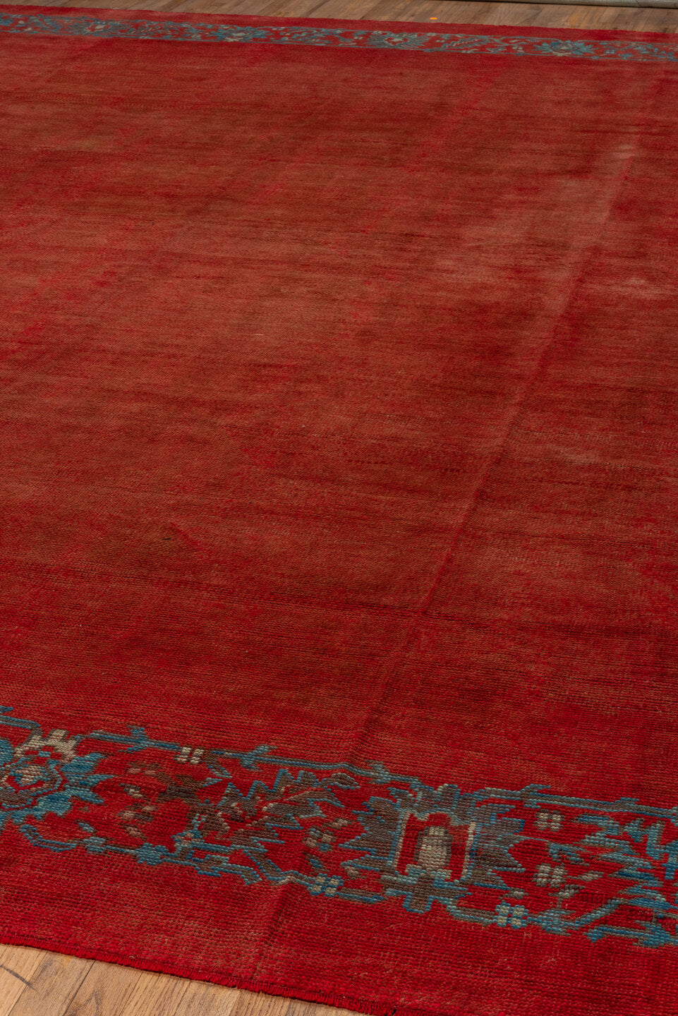 12' x 16' one-of-a-kind handmade antique Oushak oversize rug. Color palette: rust, terra cotta, slate, blue, brick, taupe