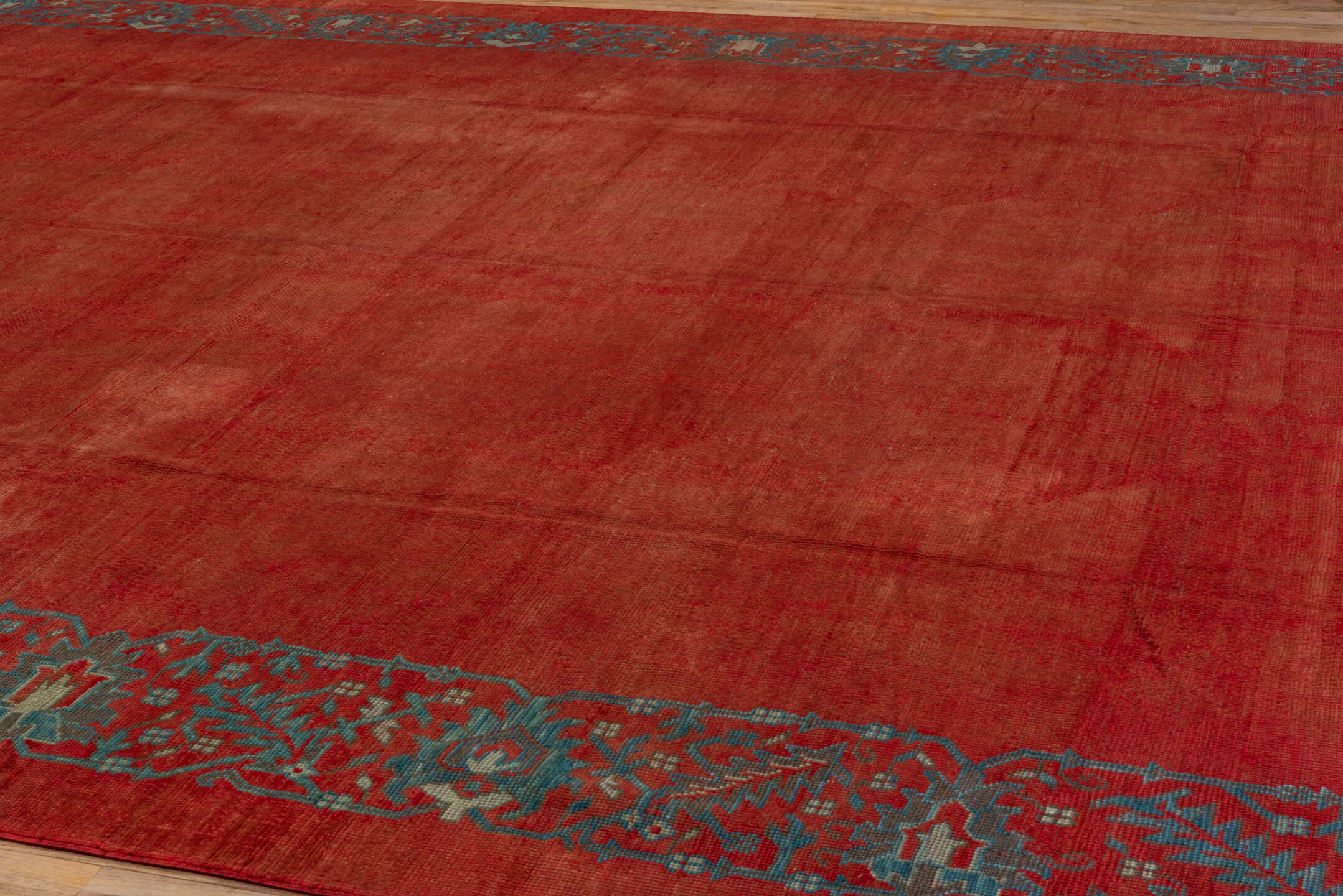 12' x 16' one-of-a-kind handmade antique Oushak oversize rug. Color palette: rust, terra cotta, slate, blue, brick, taupe