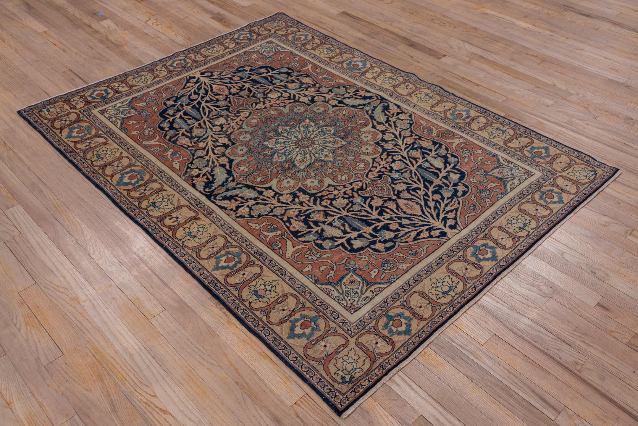 4' x 6' one-of-a-kind handmade antique Tabriz small size rug. Color palette: navy, terracotta, ivory, camel, sky_blue, rose