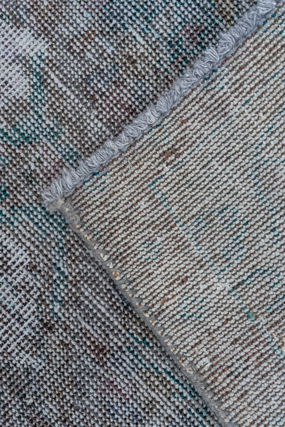 6' x 9' one-of-a-kind handmade vintage Overdyed medium size rug. Color palette: charcoal, ivory, gray, taupe, teal, lavender
