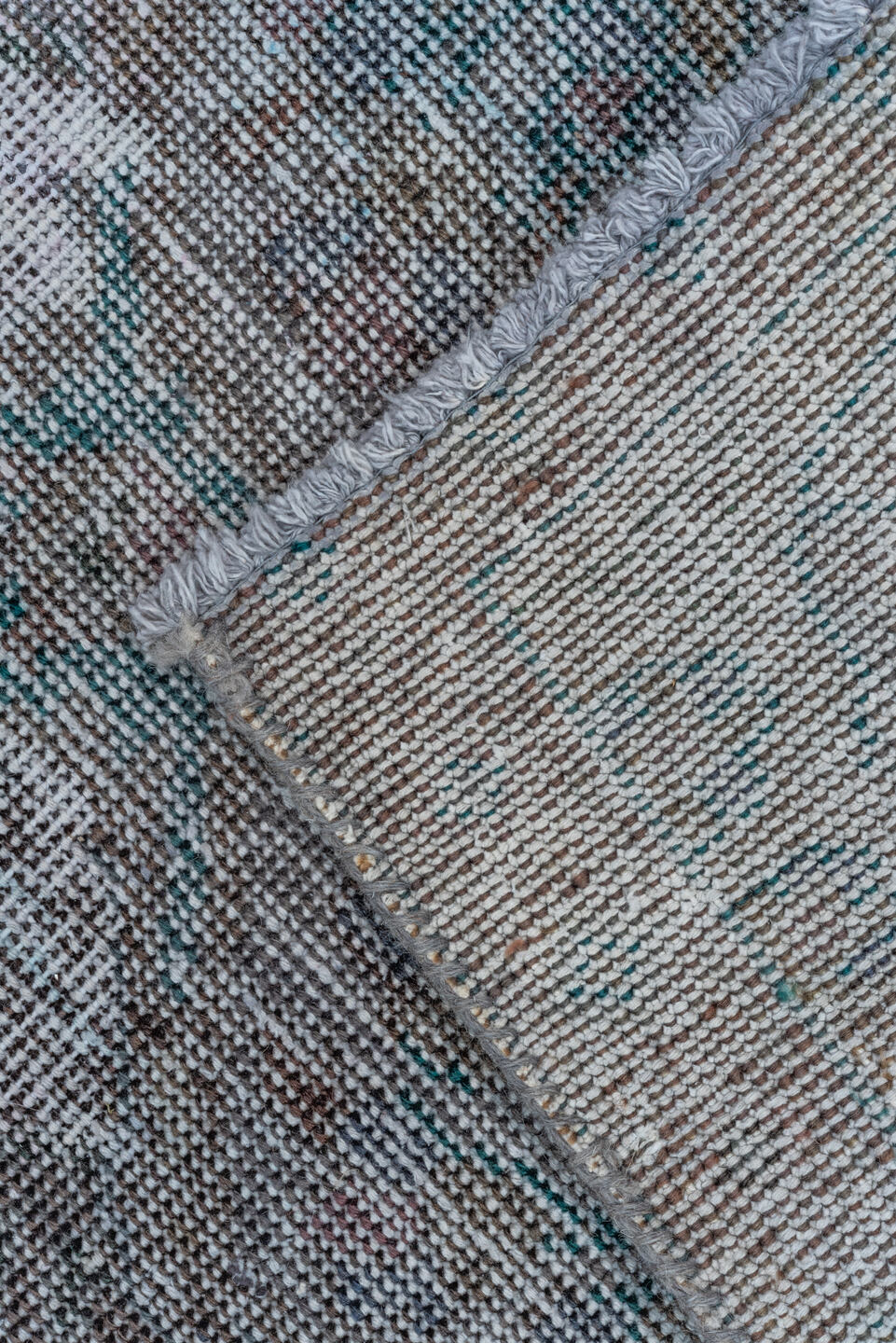 6' x 9' one-of-a-kind handmade vintage Overdyed medium size rug. Color palette: charcoal, ivory, gray, taupe, teal, lavender