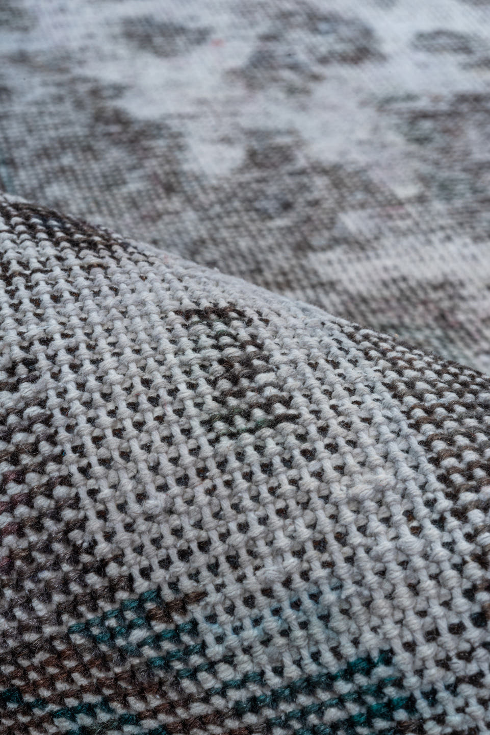 6' x 9' one-of-a-kind handmade vintage Overdyed medium size rug. Color palette: charcoal, ivory, gray, taupe, teal, lavender